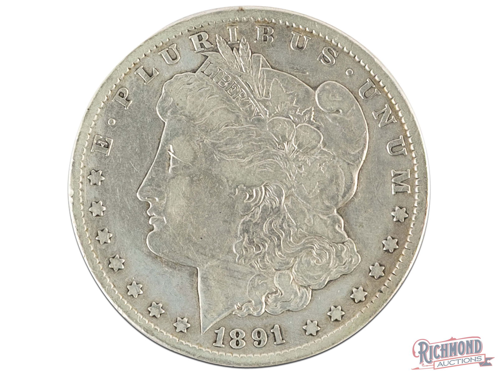 Straight Grade 1891-CC Morgan Dollar: Finding a straight grade problem free circulated Carson City dollar can be quite difficult. But here we present the perfect example. While it is still in a low circulated grade, it has the patina that