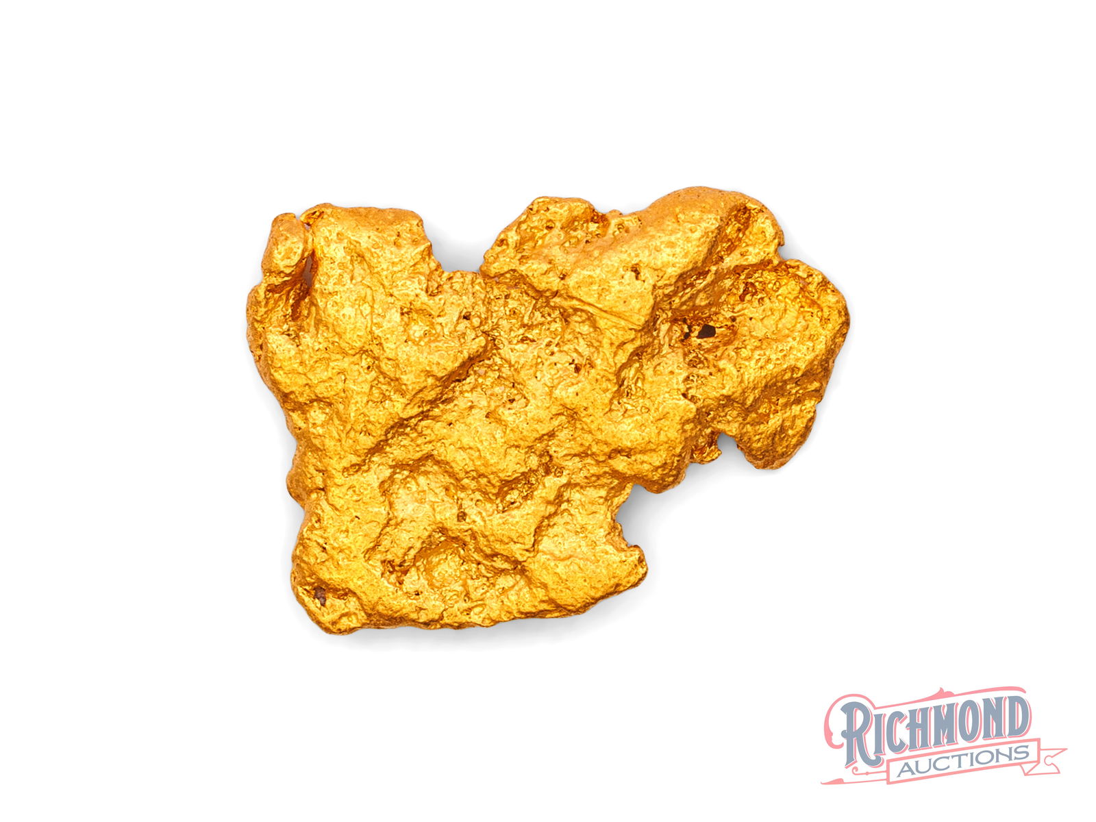 2.3g Natural Gold Nugget: This Kalgoorlie alluvial nugget was recovered from near-surface ground by a dedicated small-scale prospector. Naturally smoothed through time, it presents clean edges and impressive purity. A classic