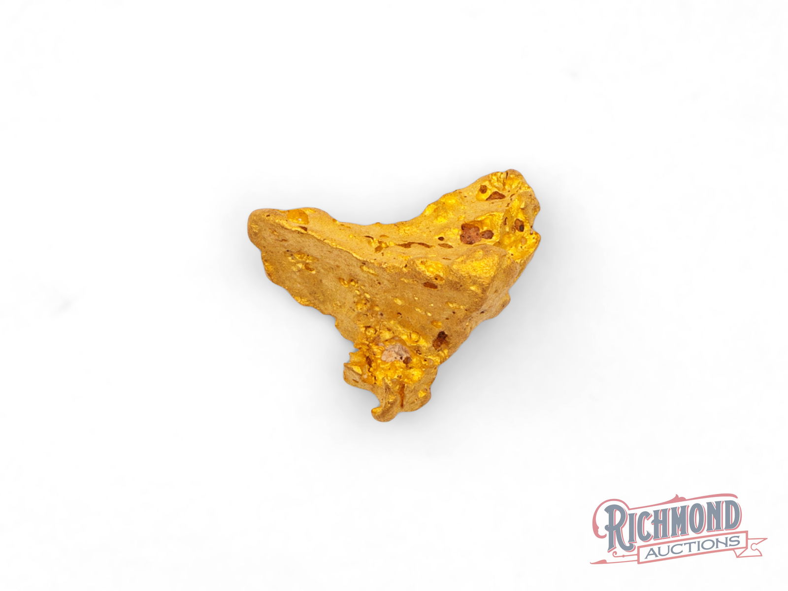 7.2g Crystalline Gold Nugget: This exceptional crystalline gold nugget, naturally formed in a distinct triangular shape, is a rare example of gold preserved in its purest and most sculptural state. Crystalline gold represents