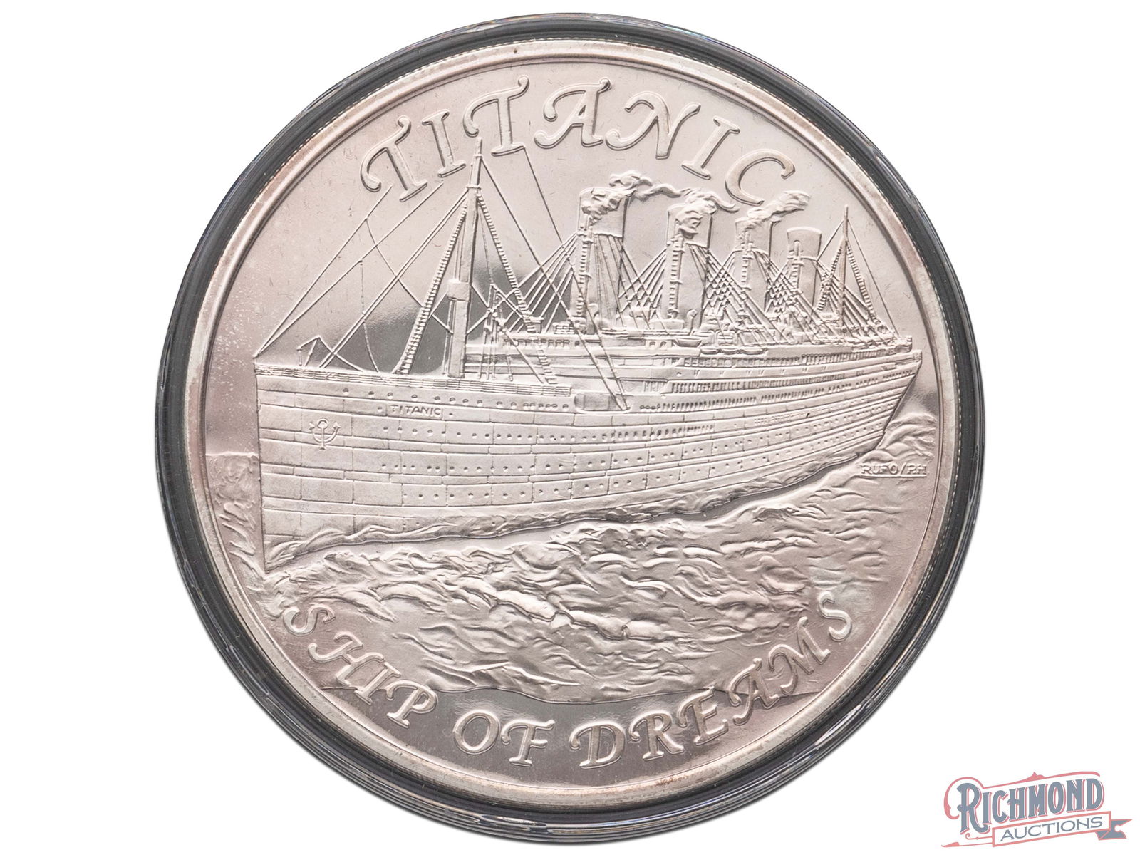Noble & Perrault Titanic Ship of Dreams 1/2 Troy Pound Silver Round: This 8 ounce silver round captures the history of the Titanic by showing the ship majestically on the front of the silver round. The back of the medal shows the famous Grand Staircase which was made f