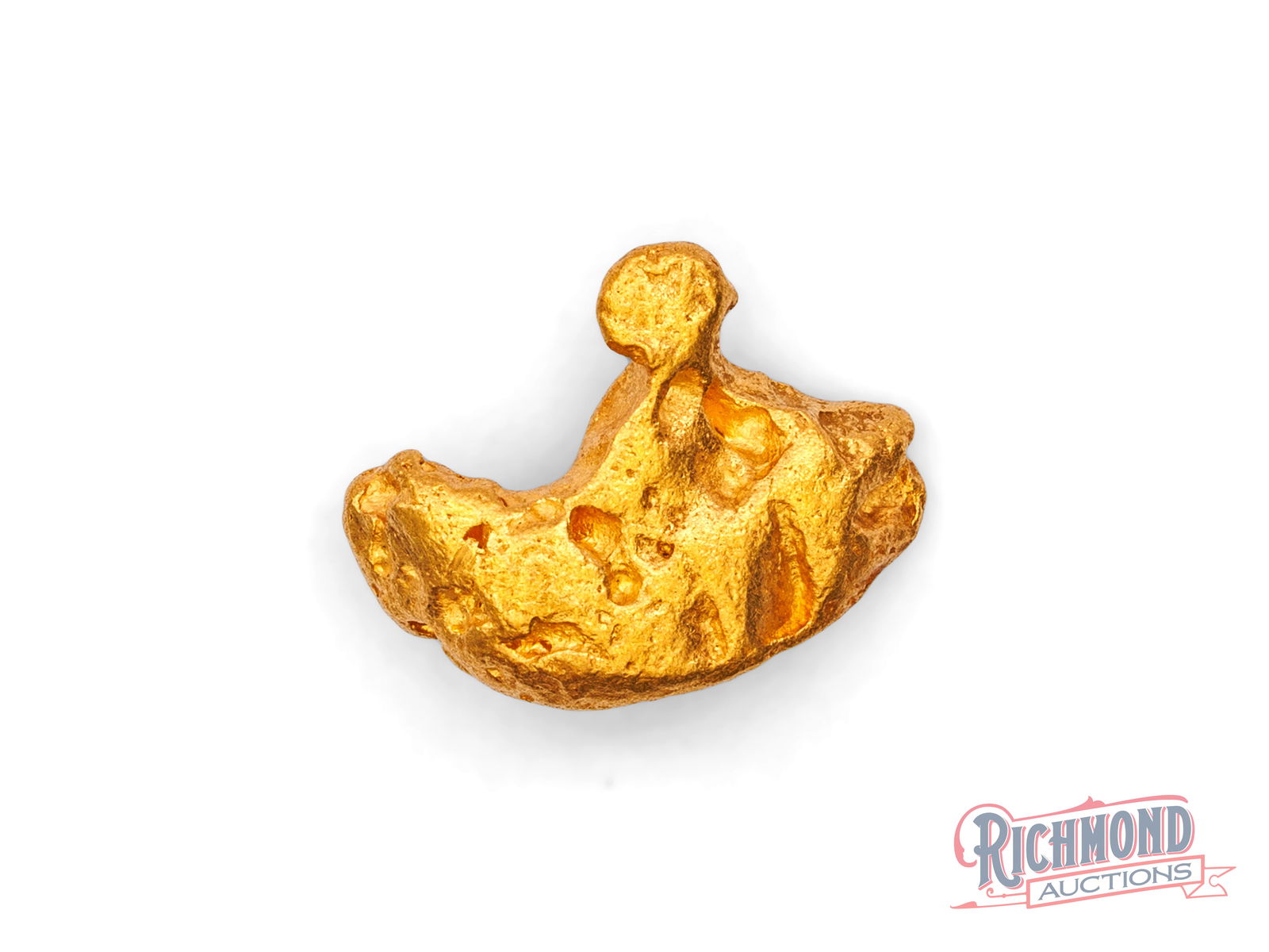 3.1g Natural Gold Nugget: Locked away since the 1980s, this nugget tells its story through its form alone. Water wear has softened its edges, showing a long journey before discovery. PURITY: 22k.