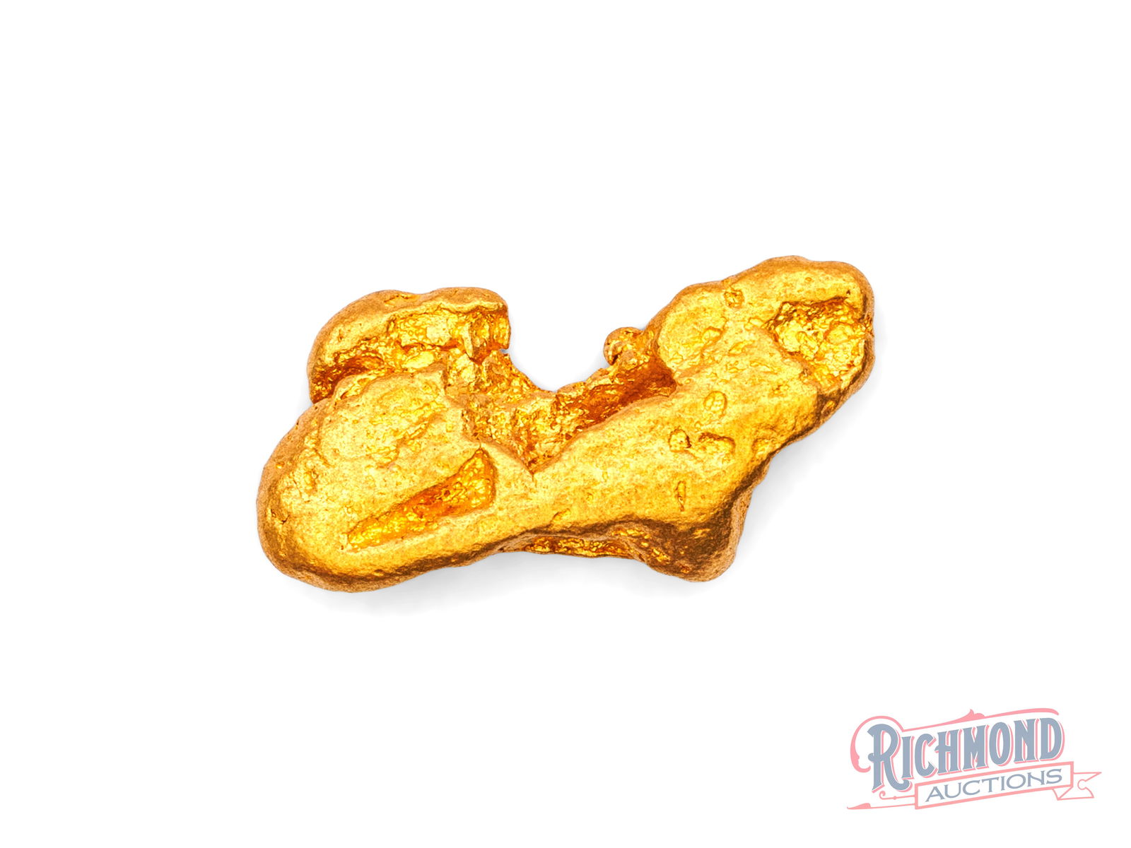 3.4g Natural Gold Nugget: Held privately since the 1980s, this nugget comes from remote Western Australia. Its water-worn appearance shows it travelled through a watercourse before stopping. PURITY: 22k.