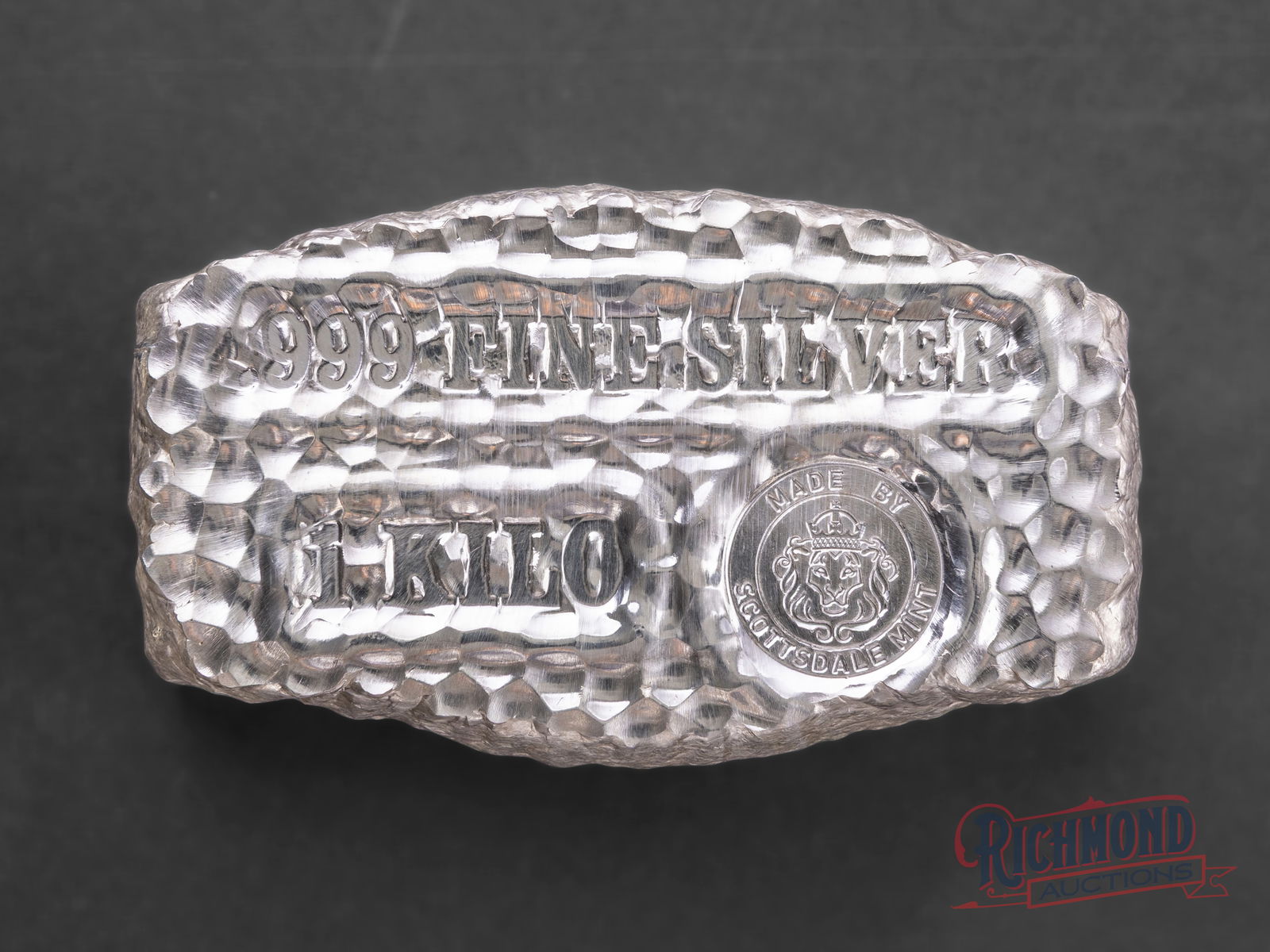 1 Kilo Tombstone Silver Nugget from Scottsdale Mint: The 1 kilogram (32.15 ounce) Scottsdale Mint Tombstone Silver Nugget is a hefty piece of silver with exceptional purity and true collector interest. As the Scottsdale Mint describes it, the silver bar