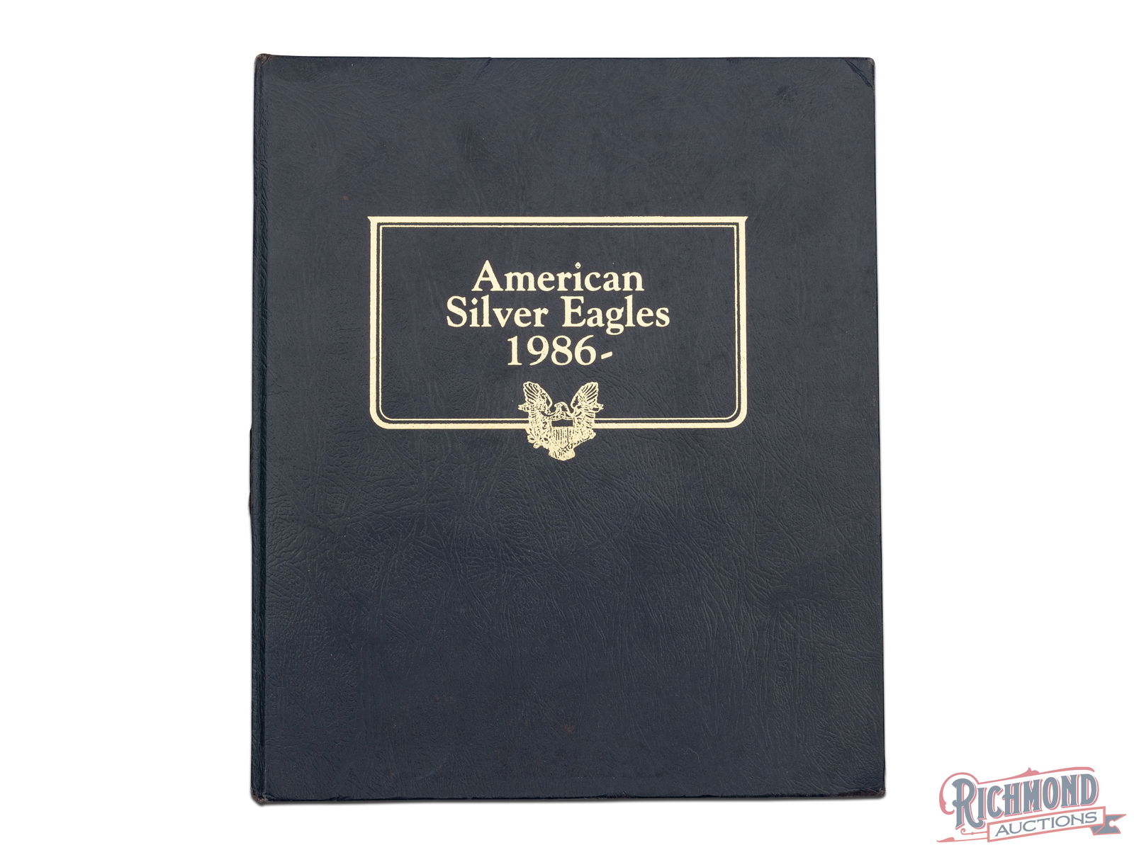 23 American Silver Eagles in a Whitman Blue Book (1 of 3)