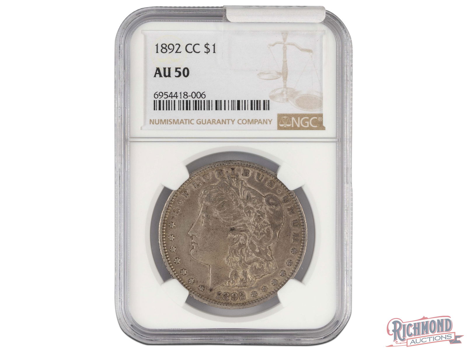Late Date 1892-CC Morgan Silver Dollar, NGC AU-50: Presented here is a collector-grade AU-50 1892-CC $1 Morgan. Most collectors will search for a while before finding an 1892-CC in this condition and with this eye-appeal. MANUFACTURER: United States M