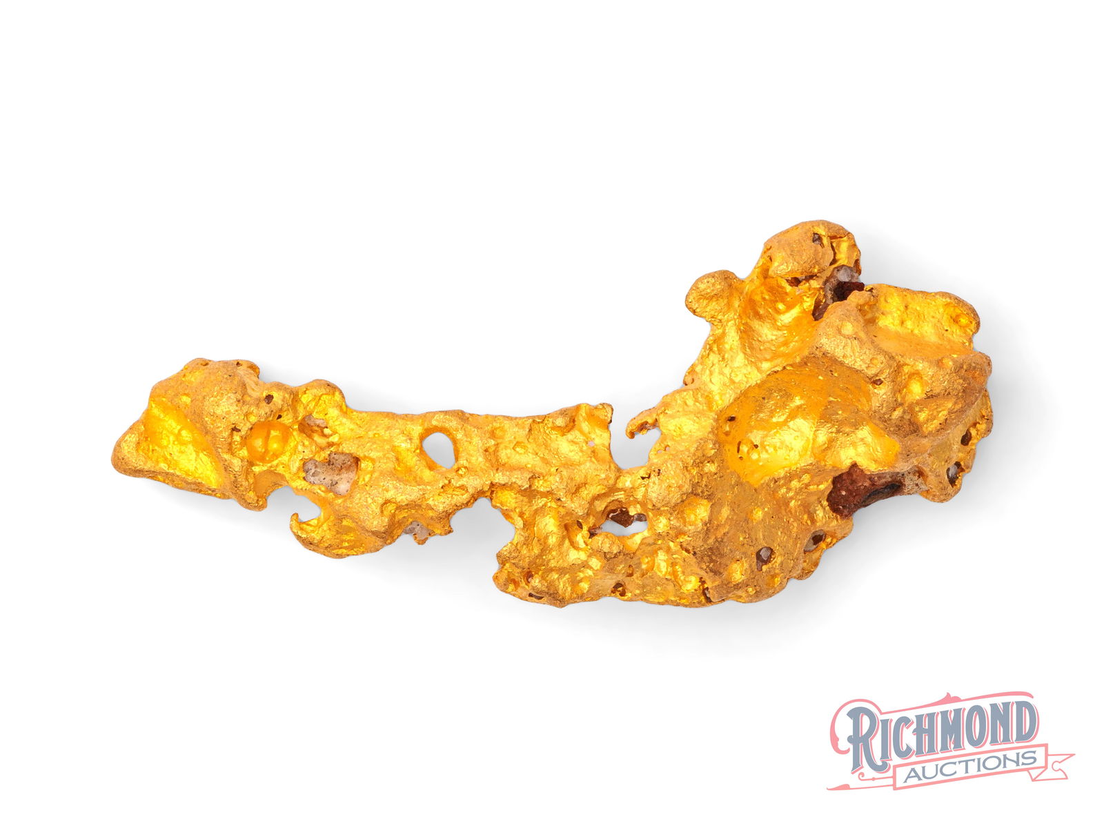 45.8g Uniquely Shaped Natural Gold Nugget: This Australian gold nugget is a striking and unusually beautiful piece, defined by its flowing, sculptural shape that looks as though it has been deliberately formed by water. Smooth curves and natur