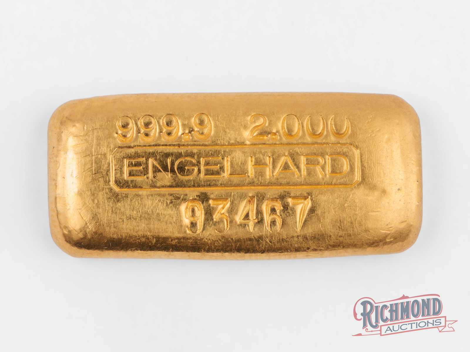 Crisp Two Ounce Gold Engelhard Bar: Offered up for sale here is a 2 troy oz Engelhard bar with 999.9 purity. The bar features the classic Engelhard hallmark in the center with the purity (999.9) and weight (2.000) lit above, and the