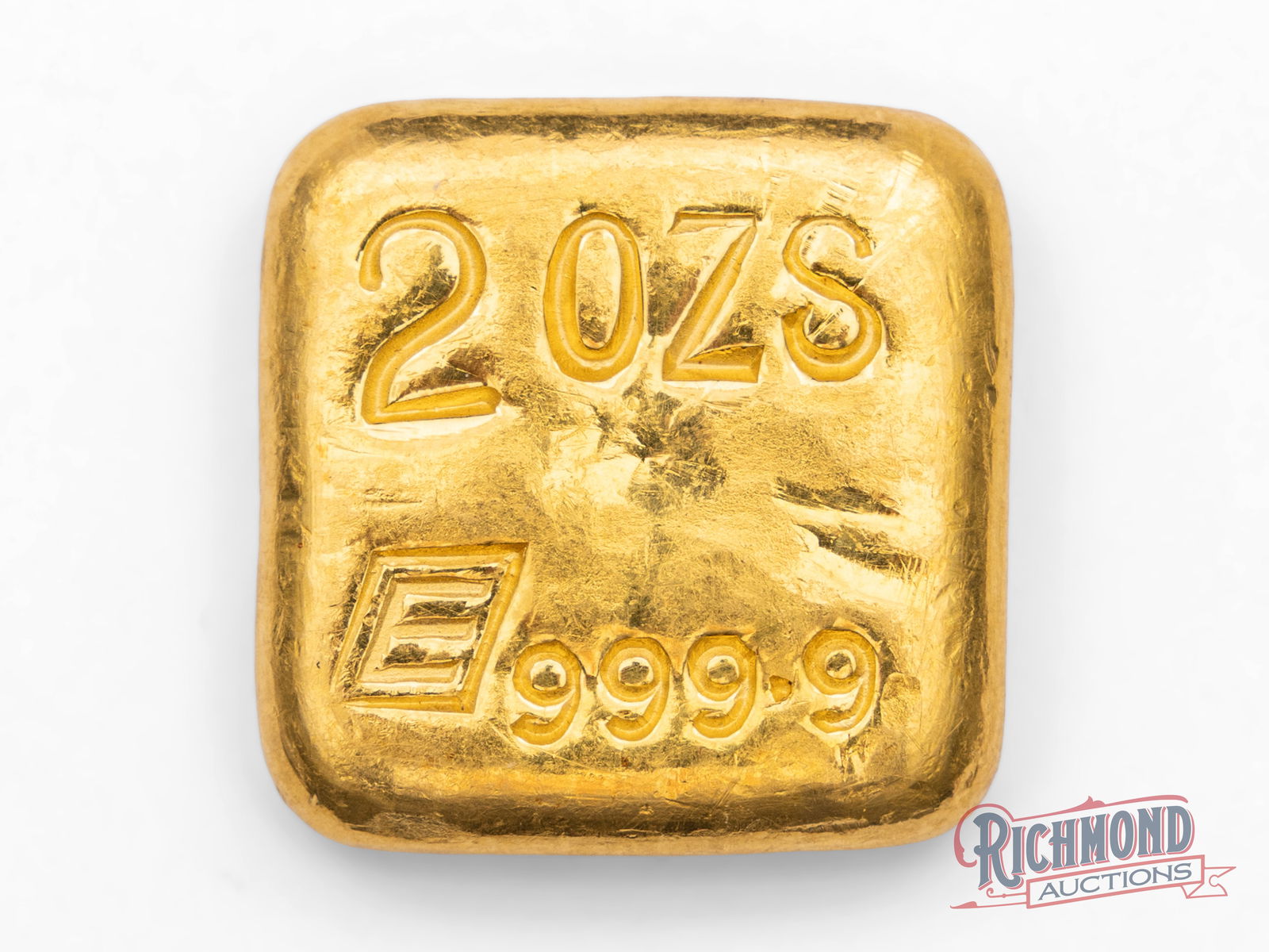Early Engelhard 2 Ounce Gold Bar: Engelhard has a history of producing high-quality gold and silver bullion products. They are known for their high purity standards and desirable low-mintage bars. This present bar is no exception.