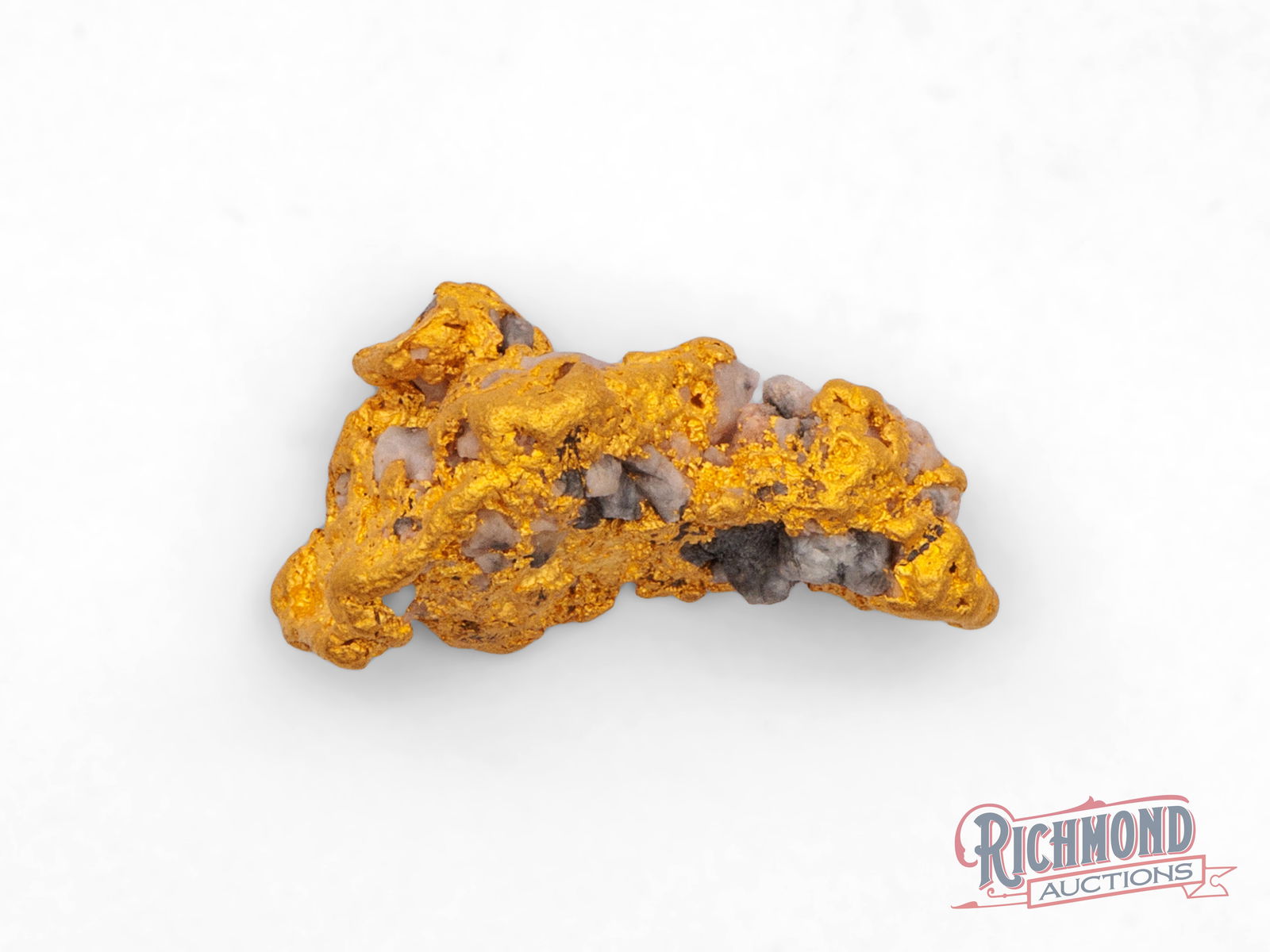 25g Blue Quartz and Gold Nugget: This beautifully water-worn gold nugget from Coolgardie has a flat, side-lying form that speaks to a long journey through ancient ground and waterways. Its surface has been naturally polished over