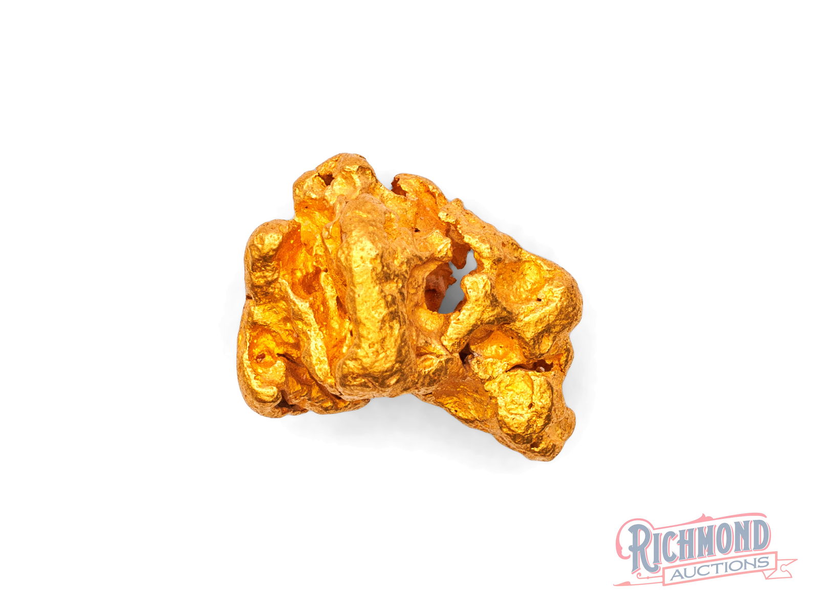 4.1g Natural Gold Nugget: Found in the WA outback by a successful prospector, this nugget has remained locked away since the 80s. Its softened edges show it travelled far through water. PURITY: 22k.