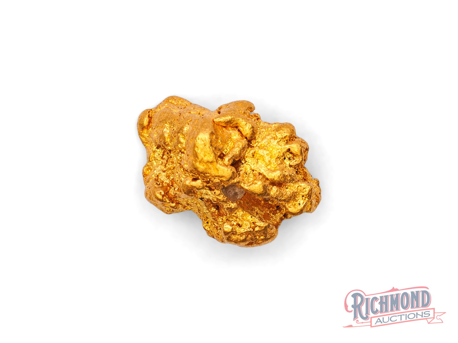 3.2g Natural Gold Nugget: This nugget was uncovered decades ago in Western Australia and stored away ever since. Its water-worn form shows it was shaped by movement before discovery. PURITY: 22k.