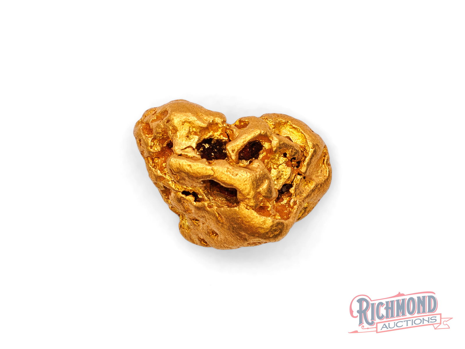 4.2g Natural Gold Nugget: Locked away since the 1980s, this nugget comes from remote WA. Its rounded edges and smooth texture show it was shaped by flowing water over time. PURITY: 22k.