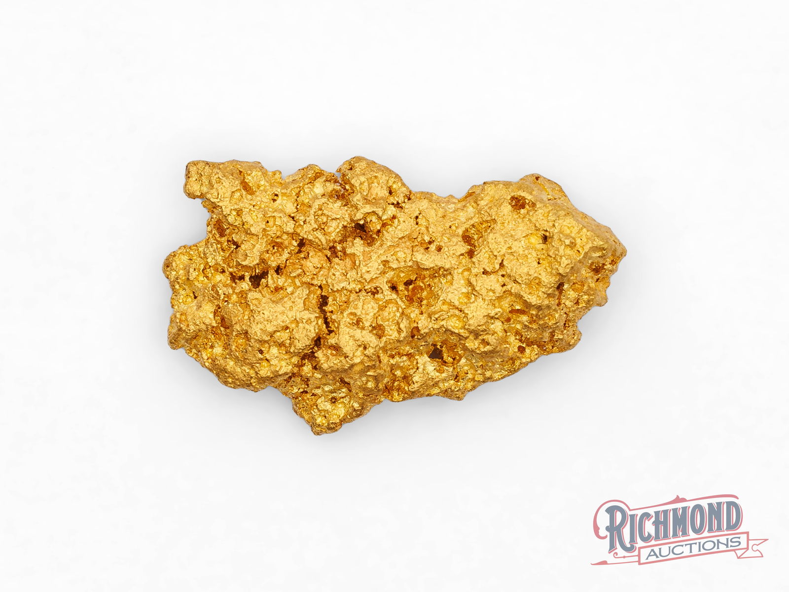 9.1g Natural Gold Nugget: This natural gold nugget was found near Kalgoorlie after a full-time prospector stripped back surface layers with a loader to expose an old wash layer beneath. Following the wash through the ground le