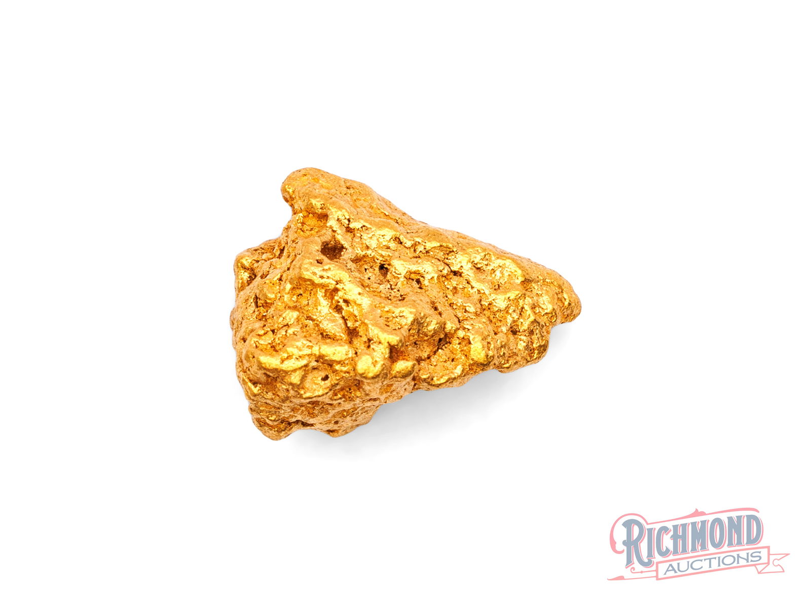 2.8g Natural Gold Nugget: Recovered in the WA outback and held privately since the 1980s, this nugget displays the unmistakable signs of water wear. It is the result of long-distance travel through flowing water before discove