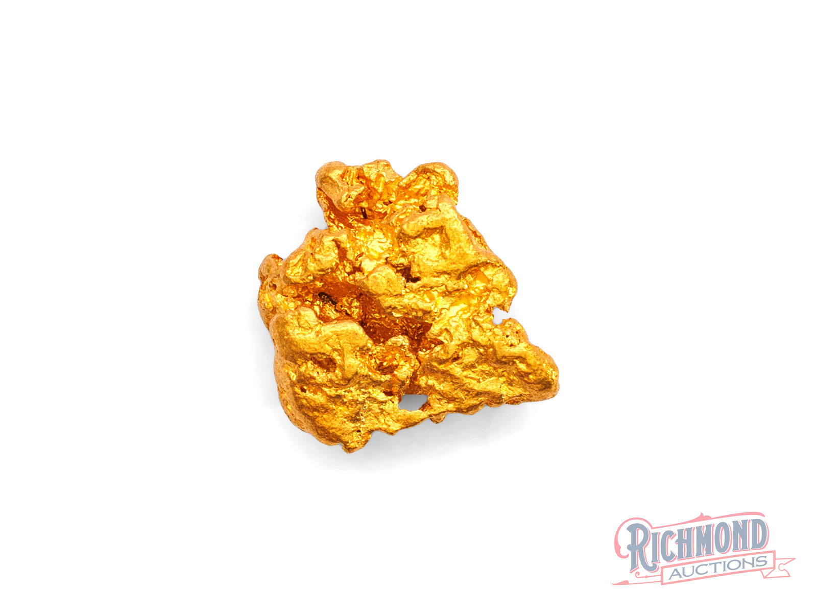 3.1g Natural Gold Nugget: This nugget was found decades ago by a highly accomplished prospector and has remained locked away ever since. The heavily water-worn surface reflects a nugget that travelled through flowing water bef