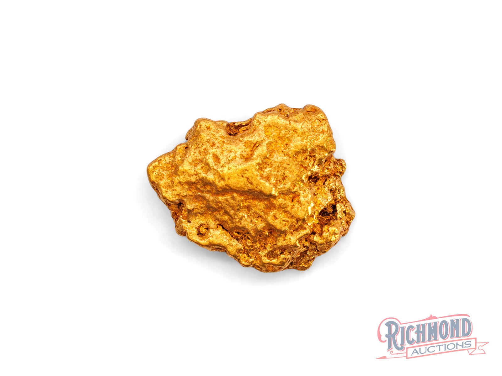 2.8g Natural Gold Nugget: Held in private hands since the 80s, this nugget was discovered by a prospector who recognized its quality. The water-worn surface shows it travelled extensively through flowing water before being tra