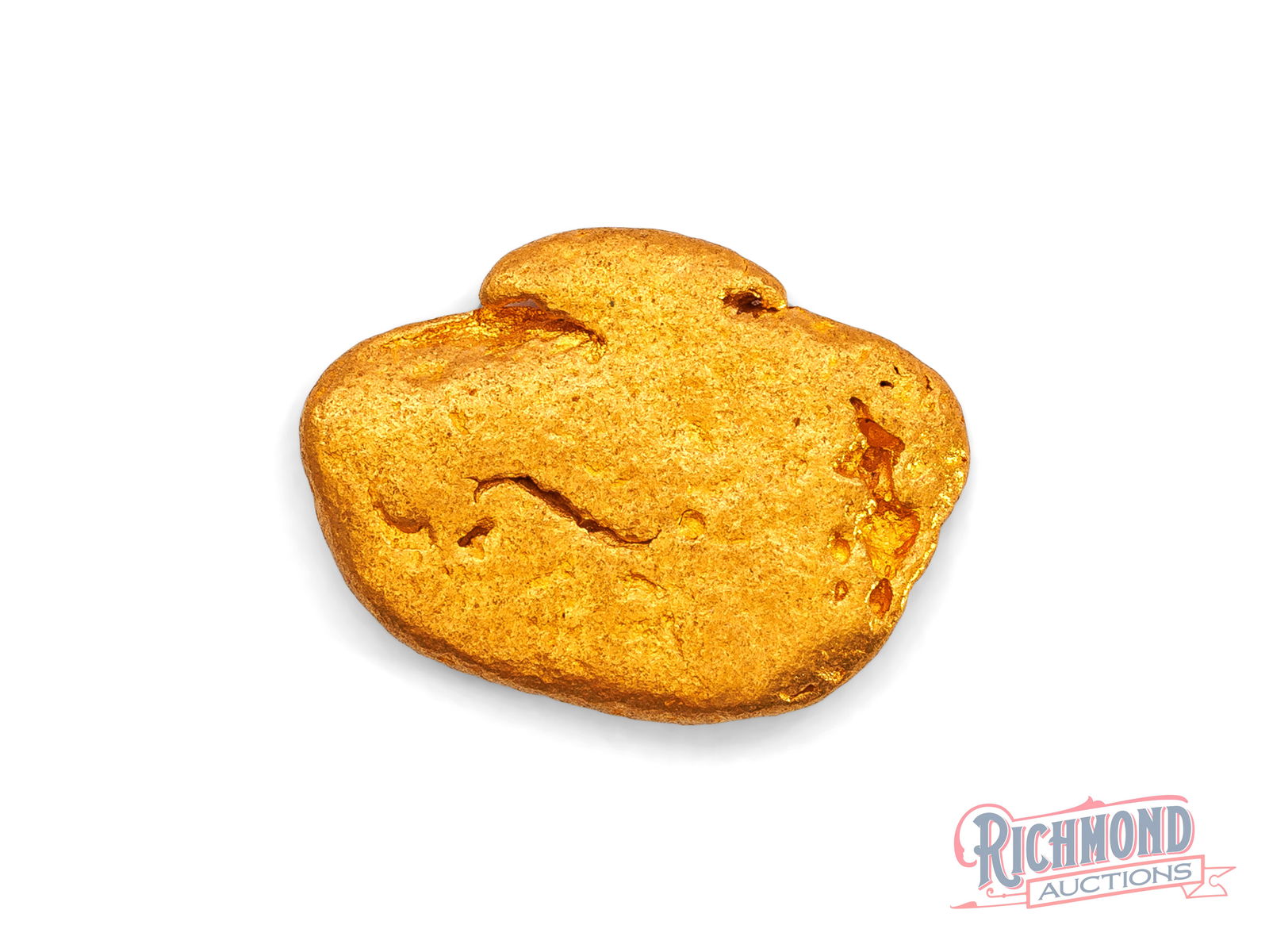 5.8g Natural Gold Nugget: This nugget has remained untouched in a vault since the 80s, held by a seasoned and successful prospector who recognized its significance. Found deep in the WA outback, its smooth, rounded form reveal