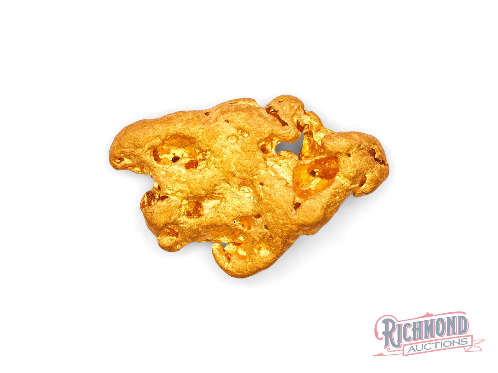 2.5g Natural Gold Nugget: Recovered near the surface in the Golden Triangle, this nugget displays strong natural brilliance and a rich gold glow. Its heavily water-worn shape tells the story of a nugget that has travelled a si