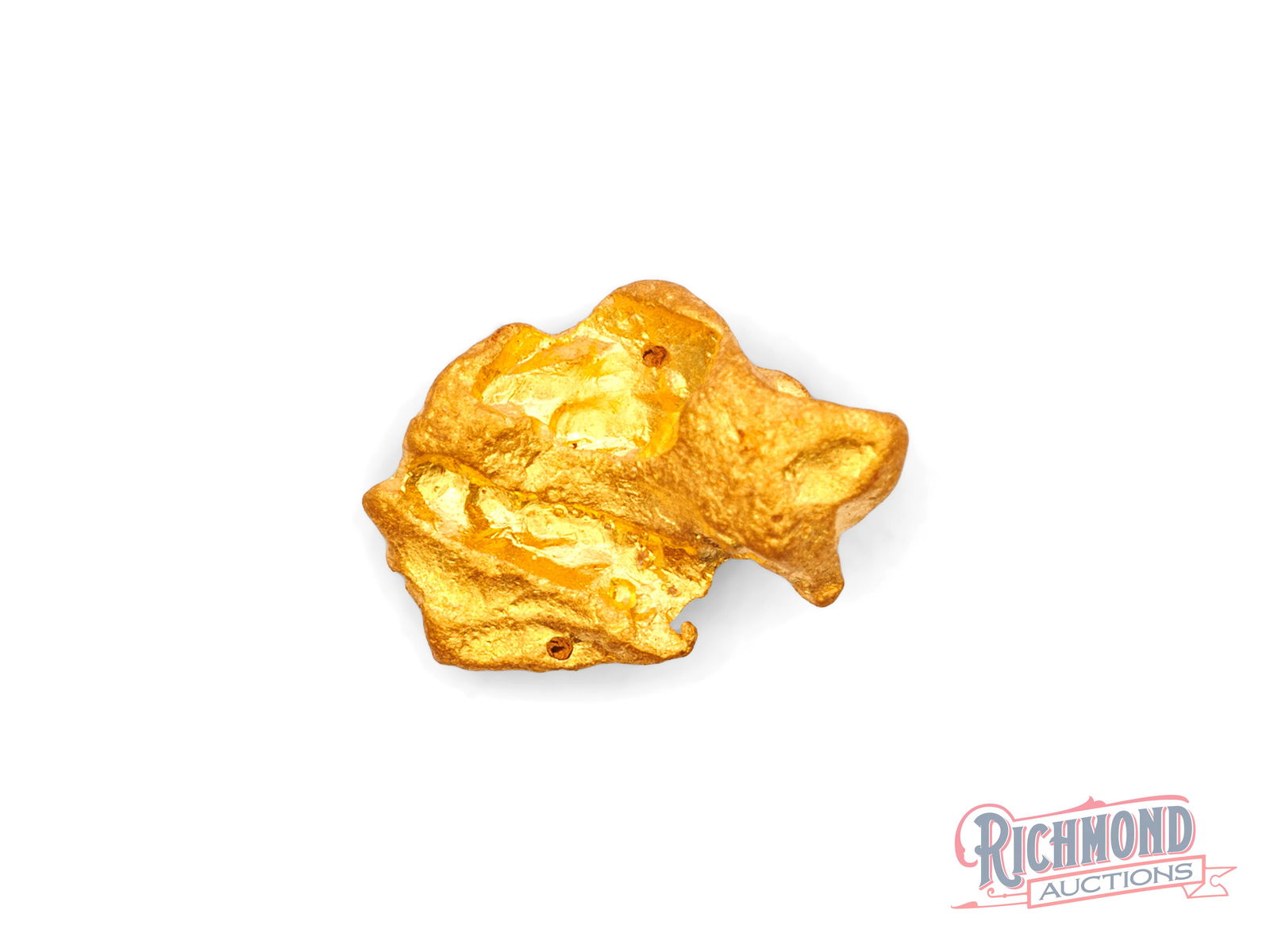 2.3g Natural Gold Nugget w/ Rare Inverted Crystals: This lustrous nugget was uncovered close to the surface in Victoria's Golden Triangle. Gold from this region is highly regarded due to its role in shaping Australia's gold mining legacy. PURITY: 22k.