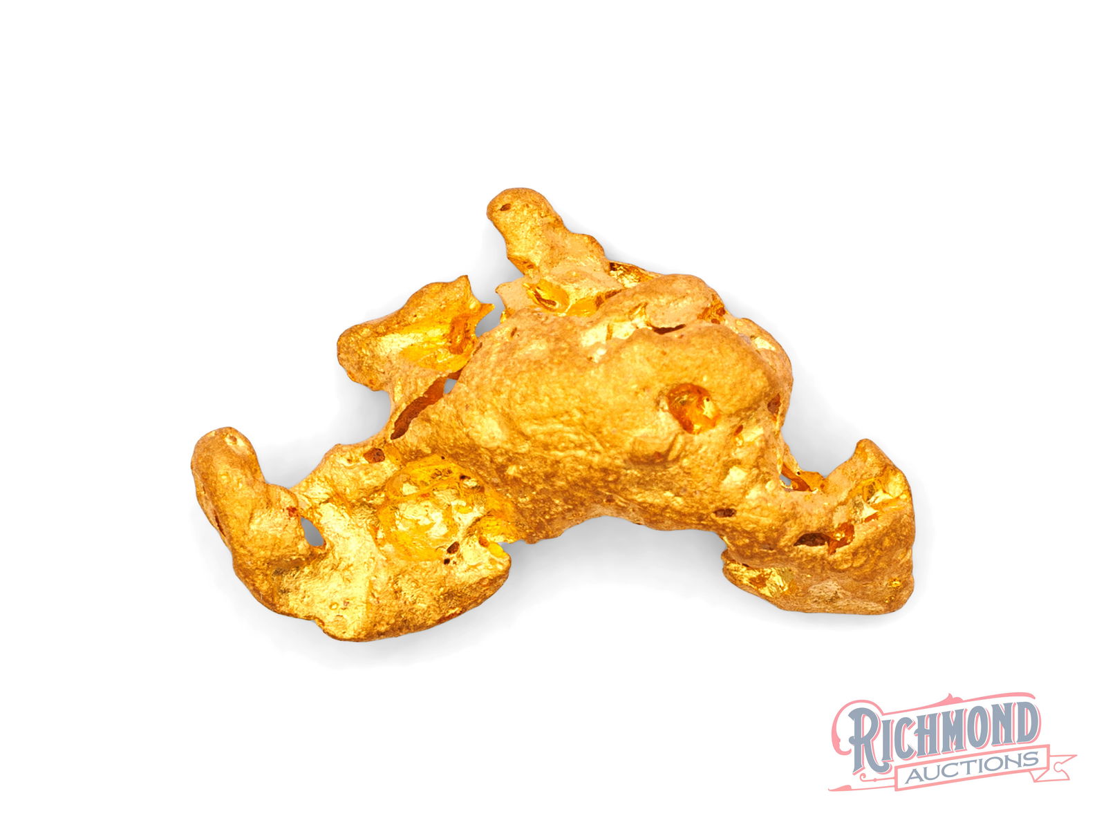 4.2g Natural Gold Nugget: This nugget was recovered close to the surface in one of Australia's most celebrated goldfields and shines with impressive natural luster. Extensive water wear across its surface reveals a long journe