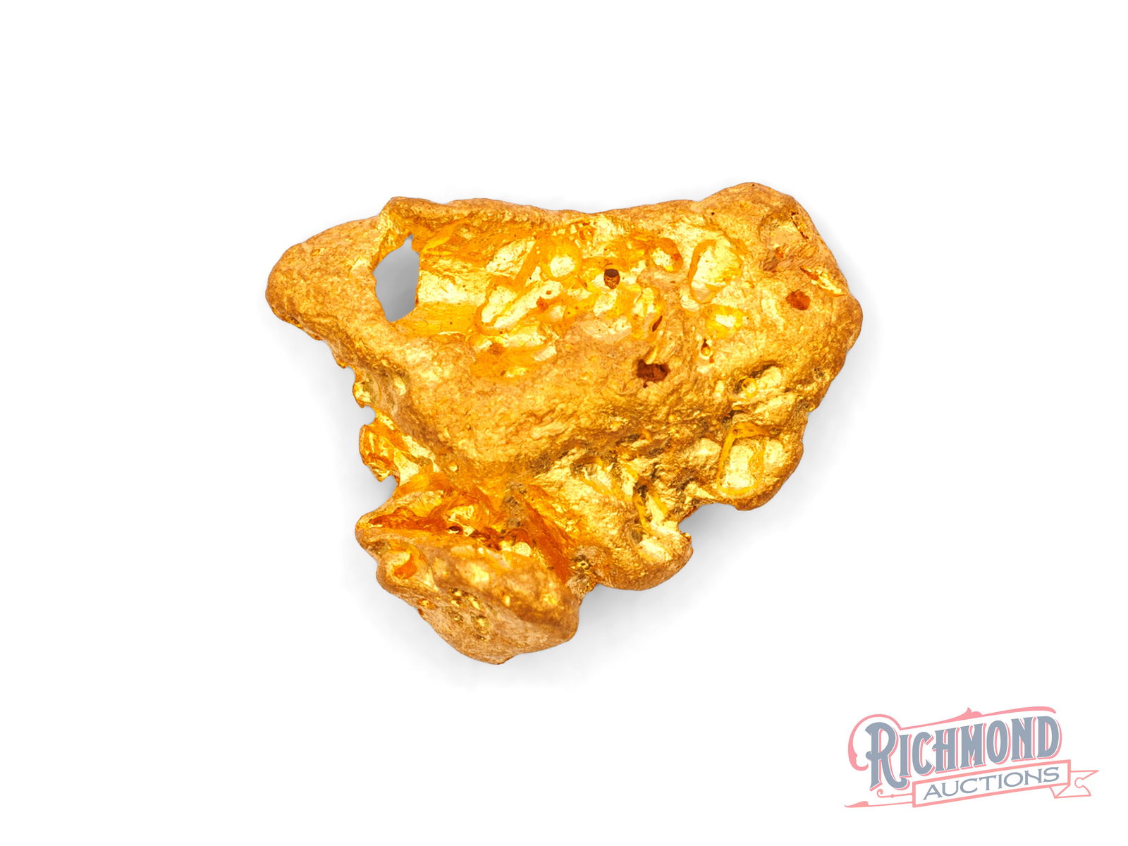 4.9g Natural Gold Nugget: Recovered from shallow ground in the Golden Triangle, this nugget combines strong luster with a softened, water-worn form. Its shape reveals extensive movement through water, a hallmark of alluvial nu
