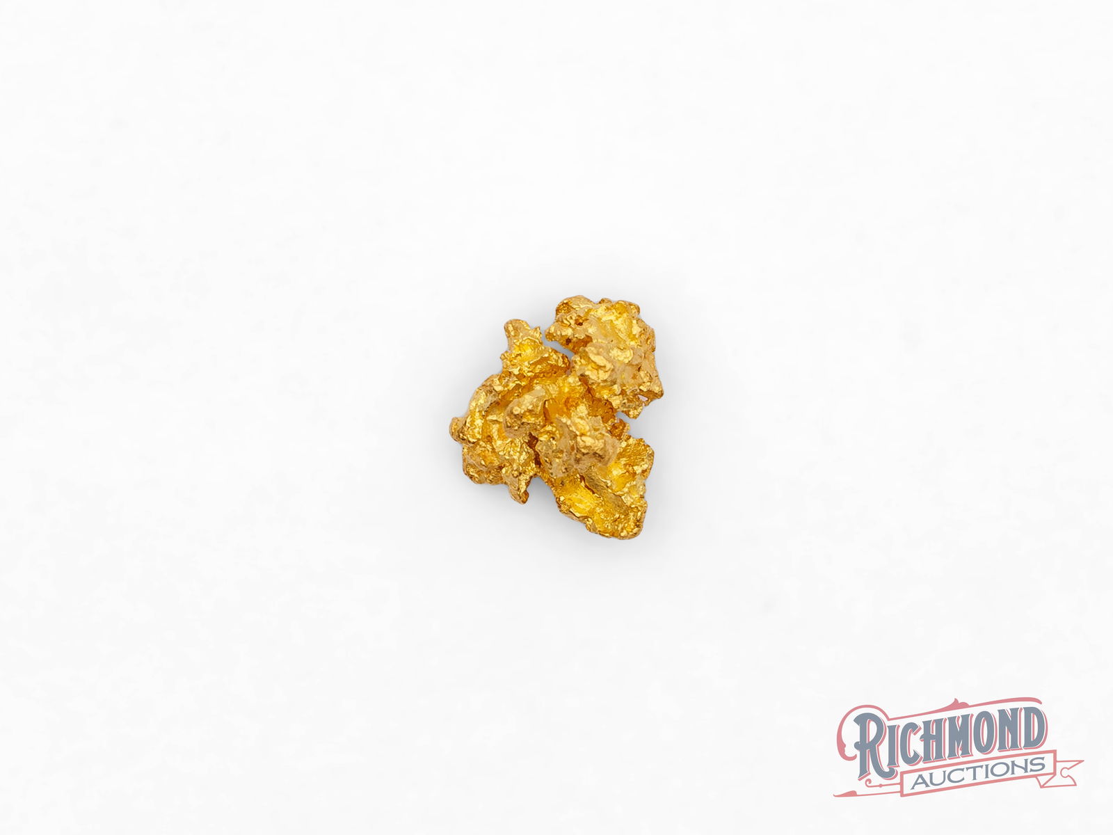 1.1g Natural Gold Nugget: This natural gold nugget was uncovered in Kanowna by the Mahoney family during full-time prospecting. With an estimated purity of around 22 carats, it displays excellent luster and a deep golden tone.