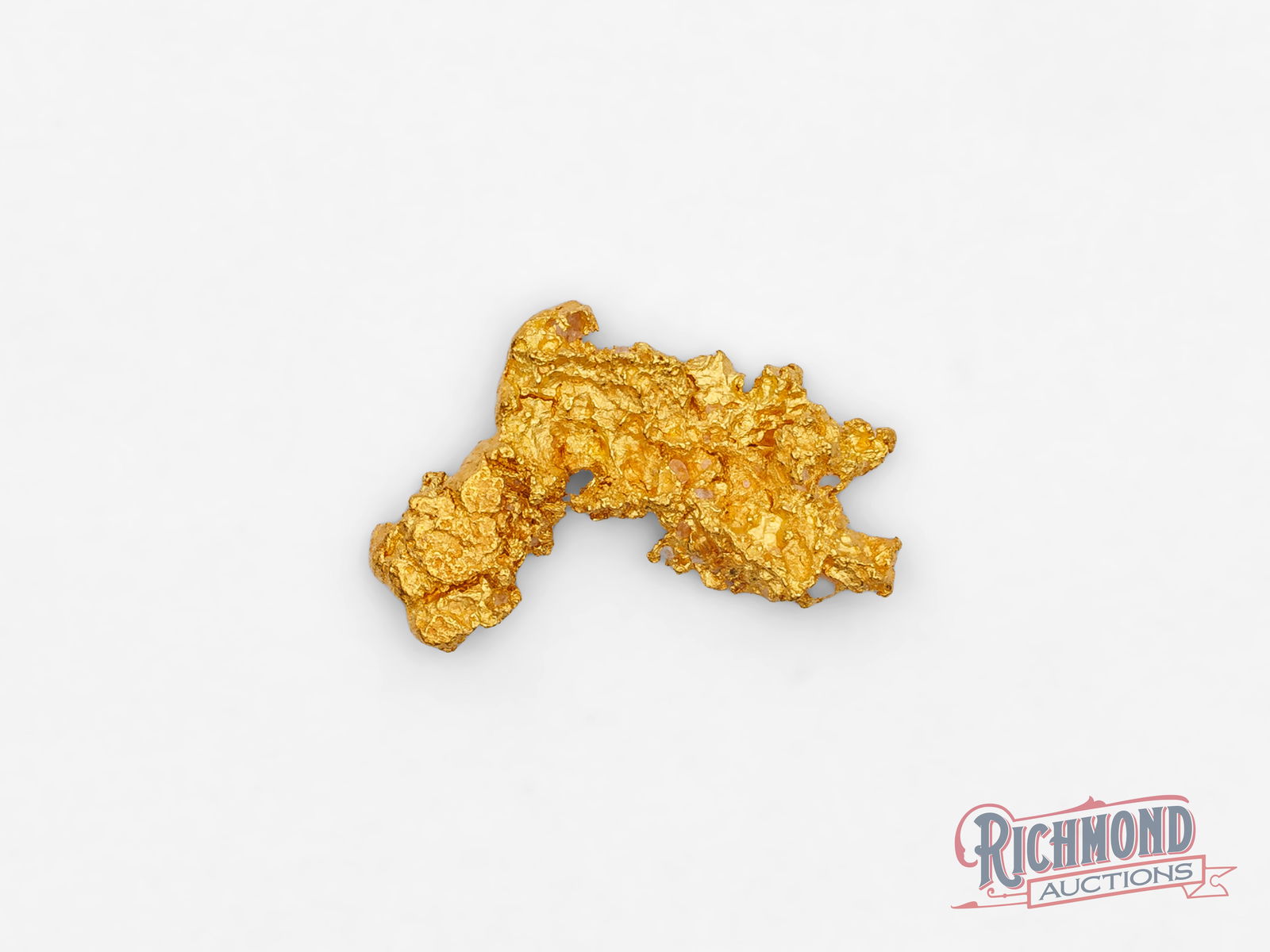2g Natural Gold Nugget: Unearthed by the Mahoney family in the historic Kanowna goldfields, this natural nugget stands out for its exceptional luster and high purity. Estimated at around 22ct, it is very pure for an alluvial