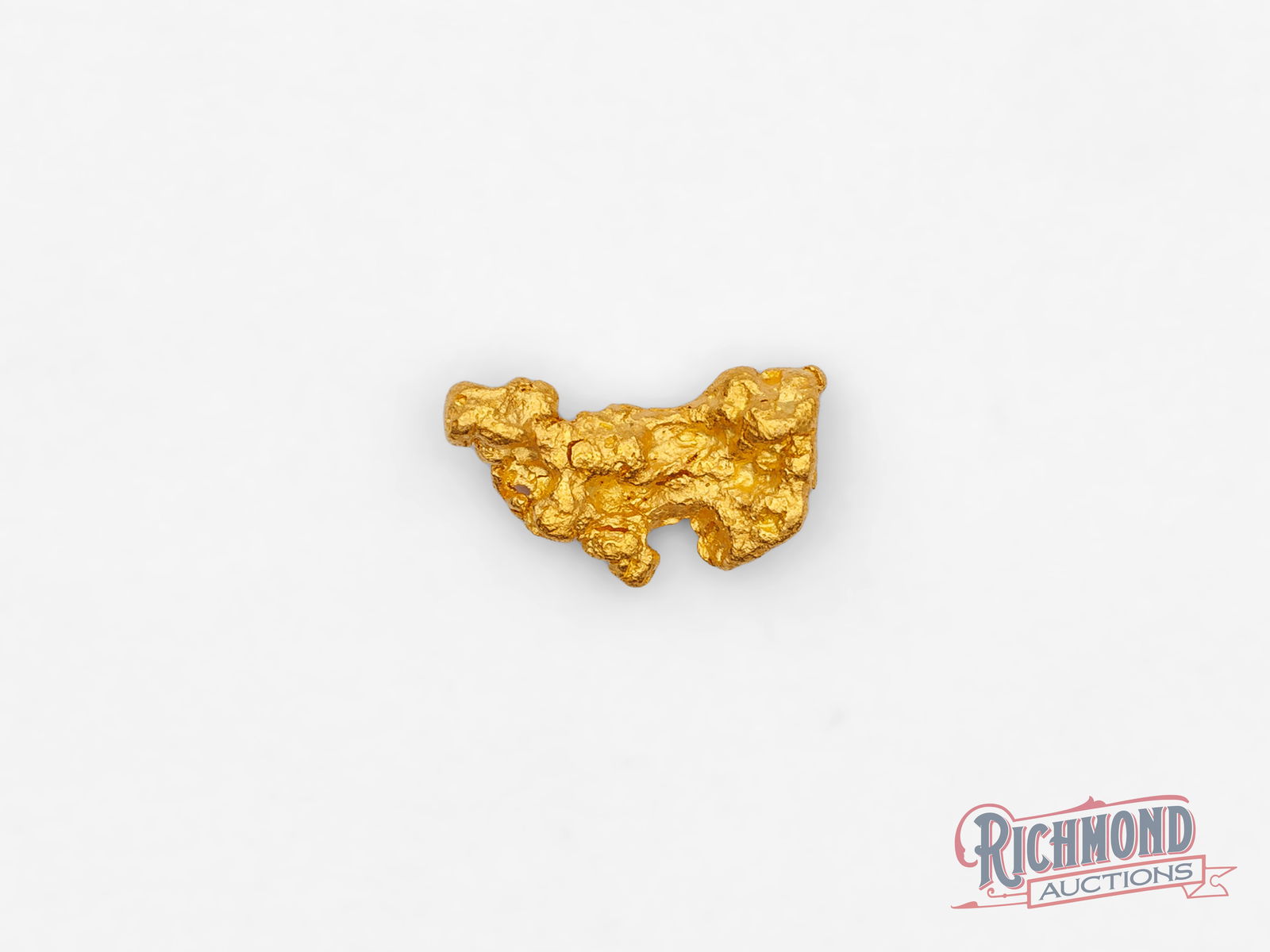 1.1g Natural Gold Nugget: This natural gold nugget features beautiful shine and strong luster, characteristics often associated with higher-purity gold. At around 22ct, it is notably pure for a naturally formed nugget. Found i