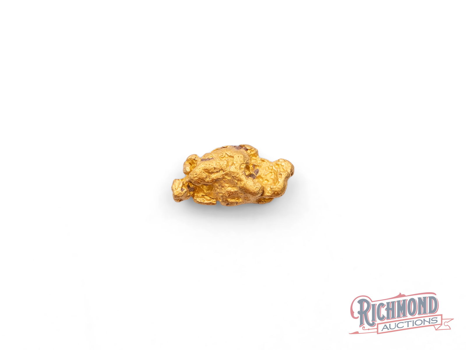 0.9g Natural Gold Nugget (1 of 2)