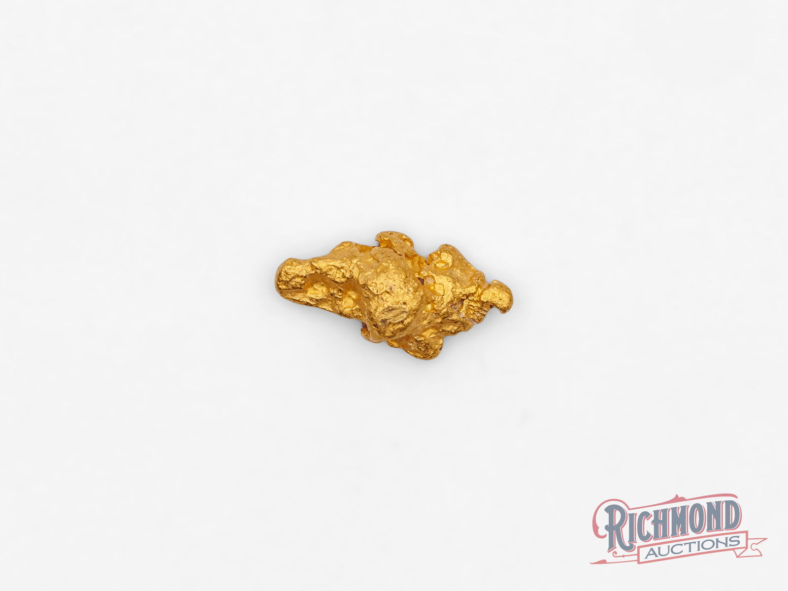 1.3g Natural Gold Nugget: Found in the historic Kalgoorlie Goldfields, renowned for their rich gold deposits, this nugget was uncovered by the Mahoney family. It embodies both the pursuit of gold and the individuality of natur