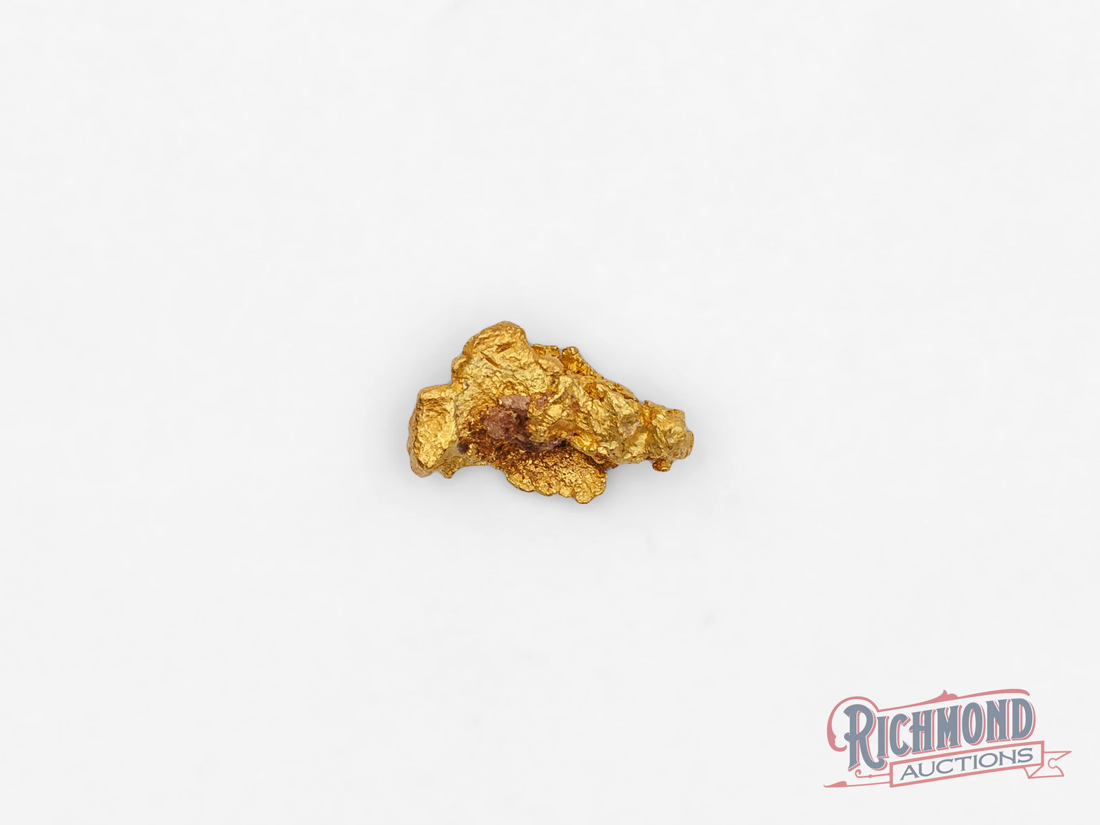0.9g Natural Gold Nugget: Found in the famous Kalgoorlie Goldfields, an area that helped define Australia's gold rush history, this nugget was uncovered by the Mahoney family through small-scale mining. It represents persevera