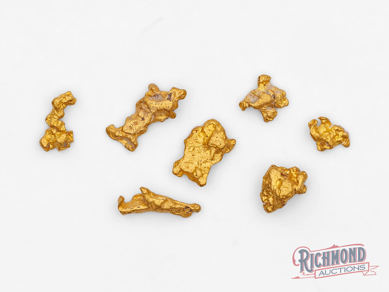 2g Natural Gold Nugget Parcel: Found in the Kanowna goldfields by the Mahoney family, this parcel of gold nuggets represents both natural beauty and practical ownership. Each nugget is one of a kind, formed entirely by nature. Buyi