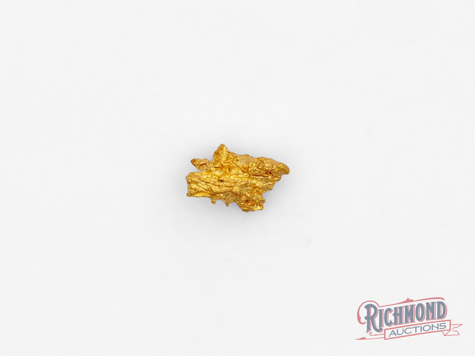 0.8g Natural Gold Nugget: Recovered from the historic Kalgoorlie Goldfields, a region synonymous with Australian gold, this nugget was found by the Mahoney family at their small-scale mining operation. Each nugget is entirely