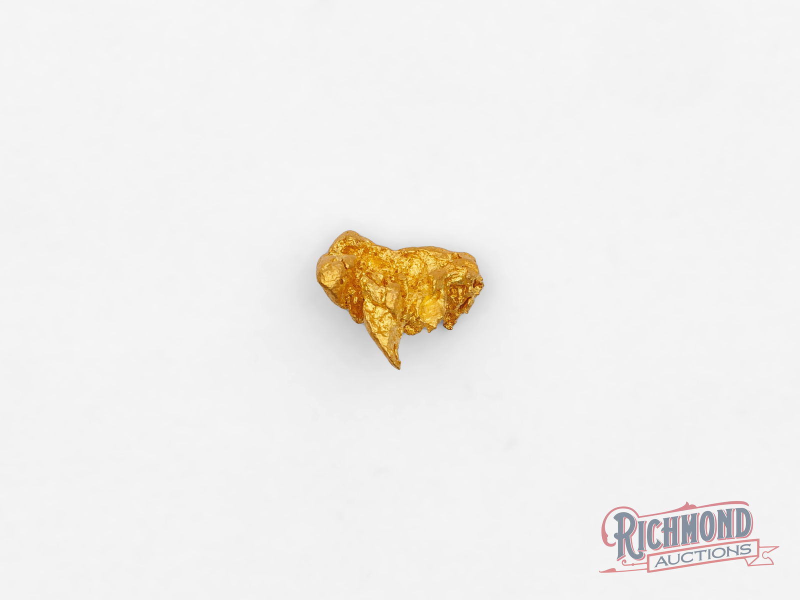1g Natural Gold Nugget: Found by the Mahoney's while prospecting full time in Kalgoorlie, this gold nugget is a natural original. Its form reflects the randomness of nature and the reality that no two nuggets-no matter how s