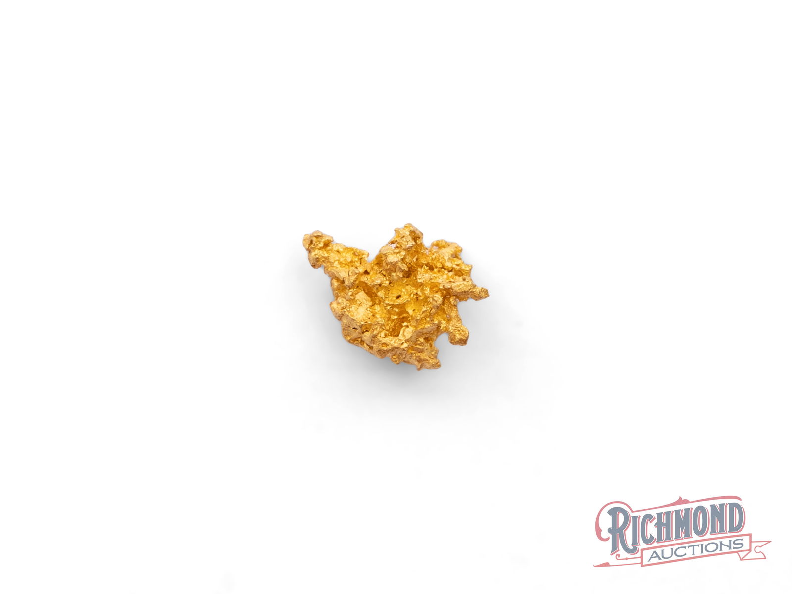 0.7g Natural Gold Nugget: This alluvial gold nugget comes from the heart of Kalgoorlie, Western Australia, discovered by full-time prospectors who work the goldfields year-round. Shaped entirely by nature, it stands as a tangi