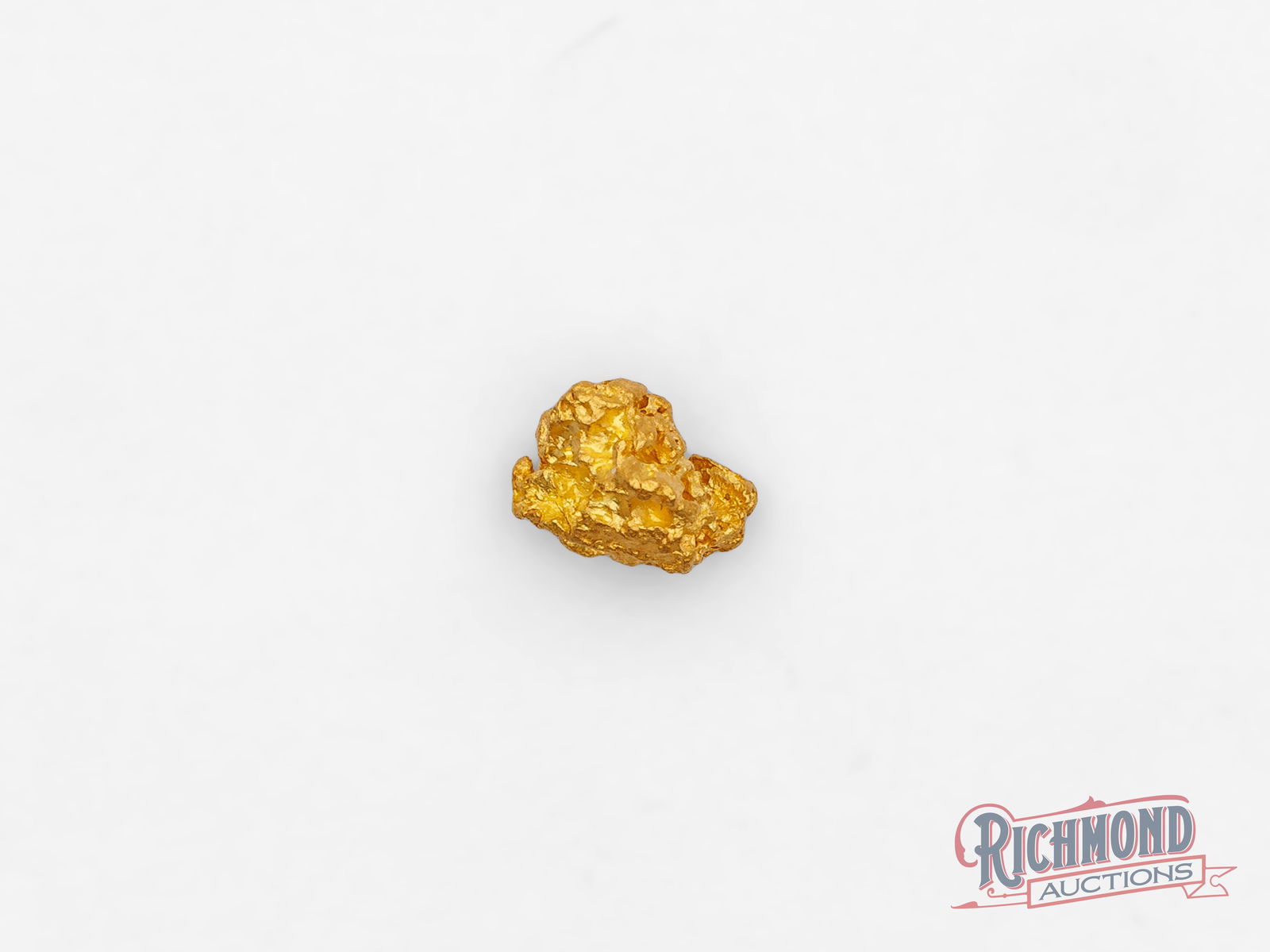 1g Natural Gold Nugget: Found by full-time prospectors in Kalgoorlie, this alluvial gold nugget reflects both natural formation and the demanding work required to uncover gold in Australia's most famous goldfields. PURITY: 2