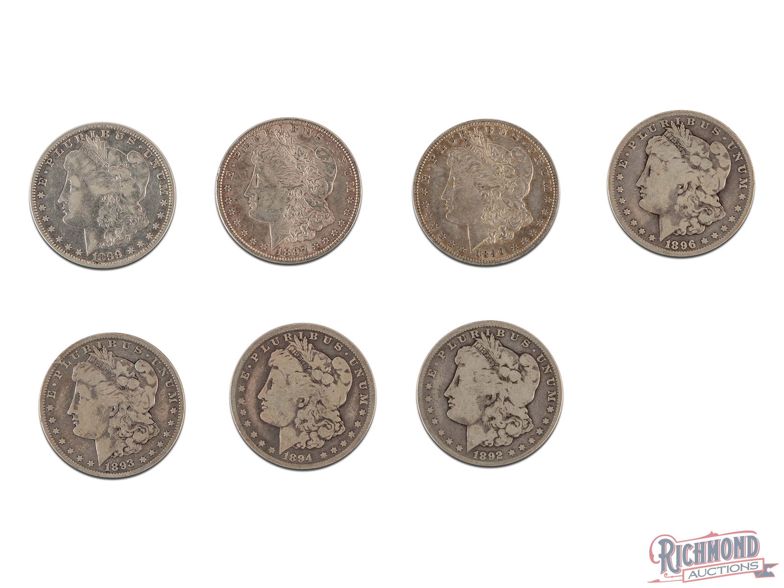 Lot of 7 Silver Dollars (1 of 2)