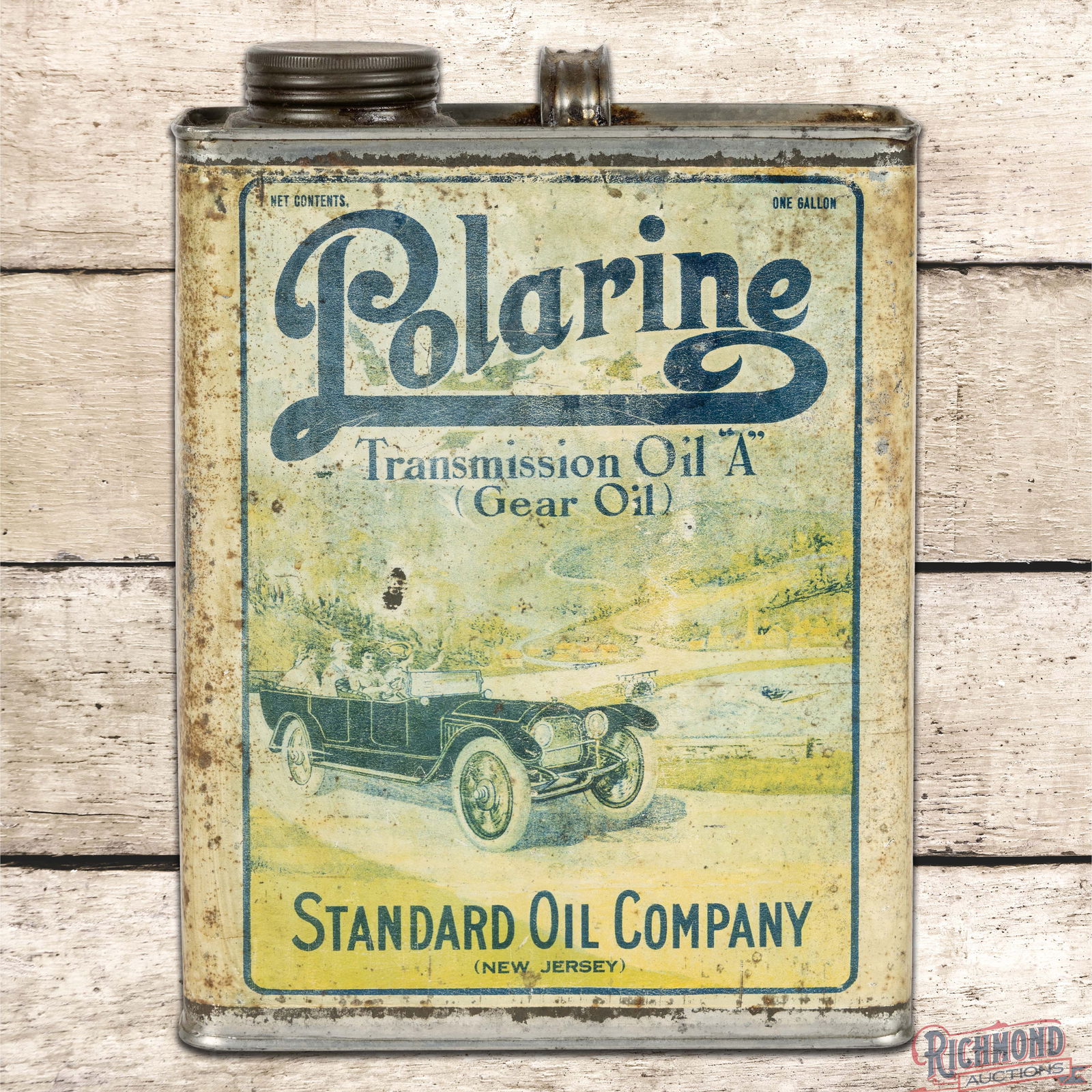 Polarine Standard Oil Company One Gallon Slim Advertising Can w/ Early Automobile: Empty one gallon metal can has good color and moderate shine. The display has areas of wear and fading with great graphics of an early automobile. The sides and reverse have additional wear and oxidat