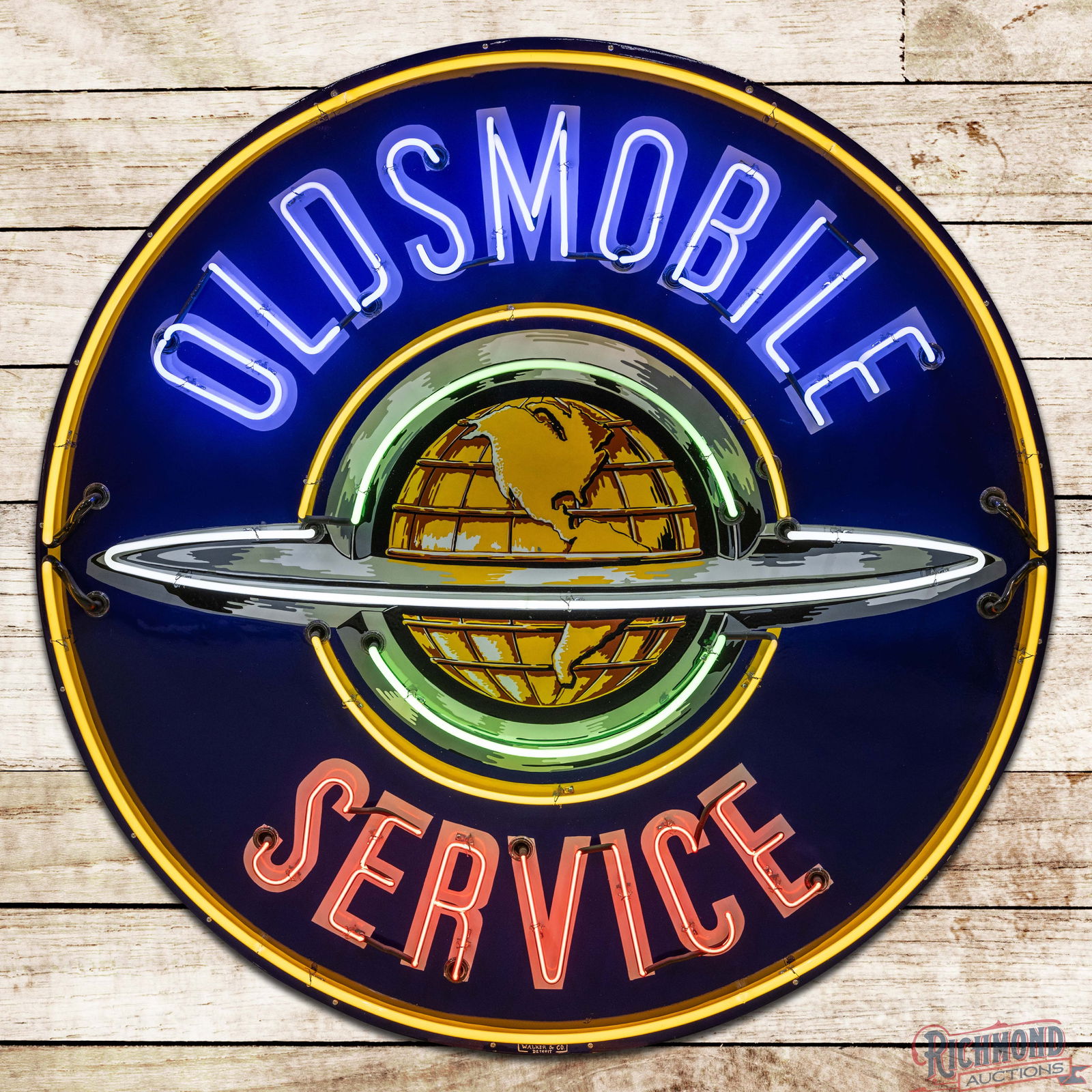 Oldsmobile Service 5' Single Sided Porcelain Neon Sign w/ World Logo: SSP (Single Sided Porcelain) sign with added neon and a new metal can has been professionally restored. The sign features vibrant five-color neon, which perfectly accentuates the sign. The display and
