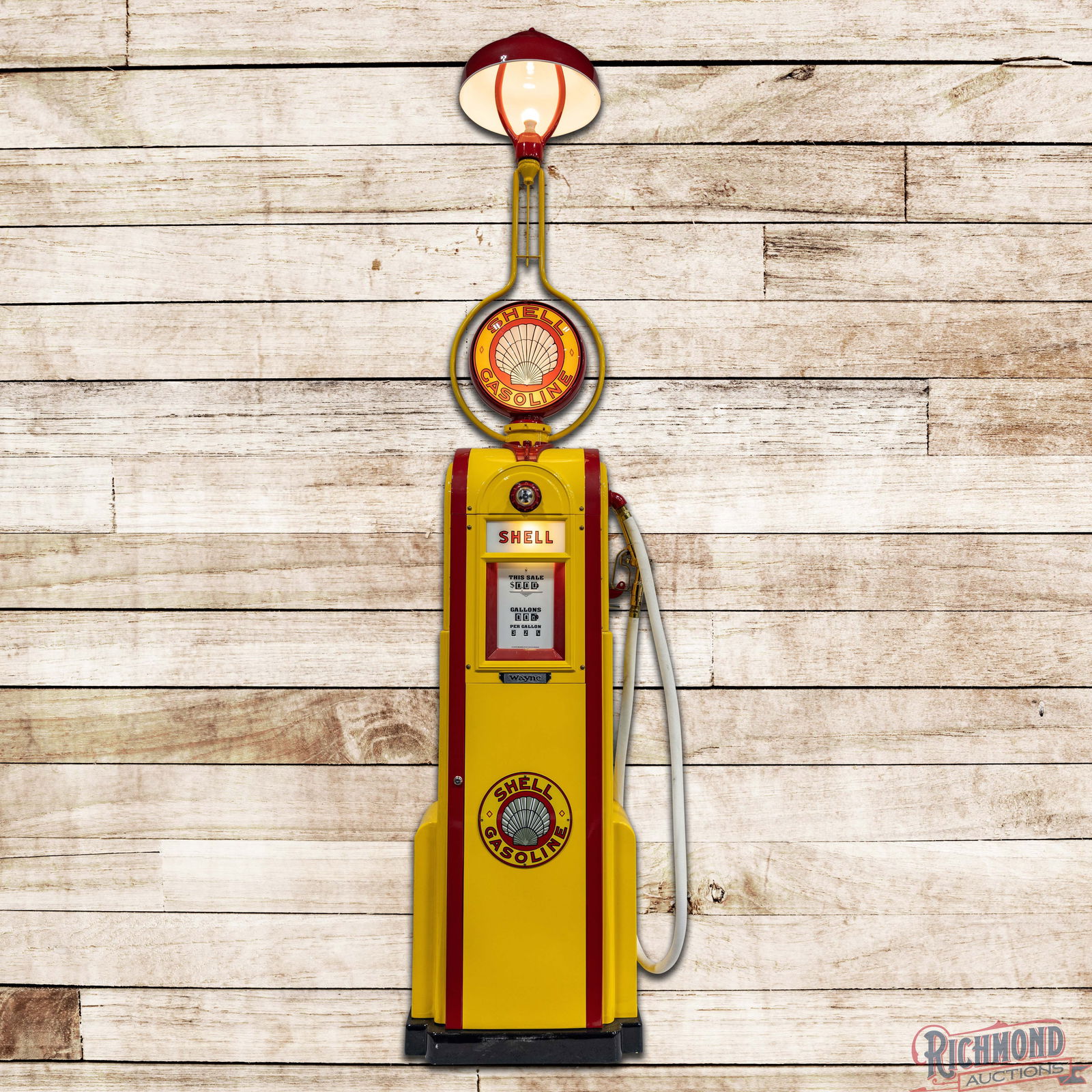 Wayne Model #60 Computing Gas Pump Restored Shell Gasoline: Fantastic Wayne Model #60 has been professionally restored. The pump features classic Shell colors with vibrant paint, high gloss and minor surface imperfections. The pump includes reproduction Shell