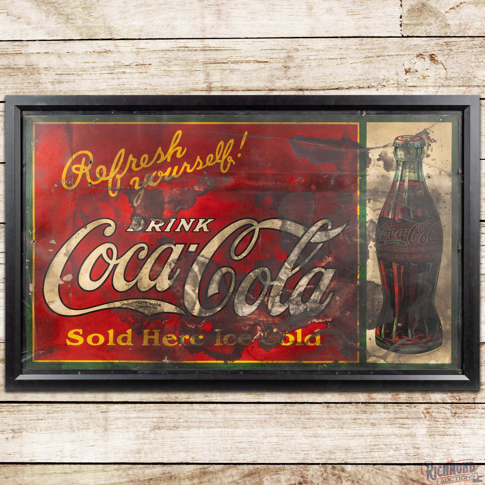 Refresh Yourself! Drink Coca Cola Sold Here Ice Cold 5' Framed SS Masonite Sign w/ Bottle: Single sided Masonite sign with factory tin crimped edges has been framed under plexiglass. The sign exhibits general age-related wear throughout with discoloration and non-factory holes in the
