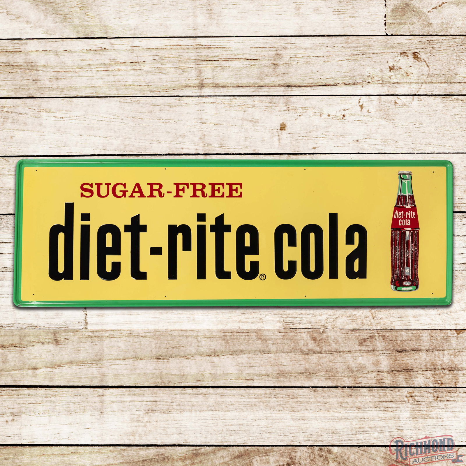 Amazing NOS Sugar Free Diet Rite Cola w/ Bottle Emb. Single Sided Tin Sign: NOS (New Old Stock) SST (Single Sided Tin) embossed self-framed sign has excellent color and shine. The field is exceptionally clean with minor storage imperfections. The perimeter has a slight bend