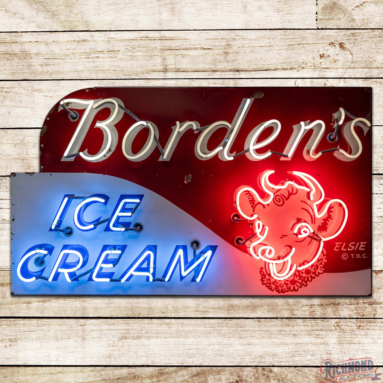 Borden's Ice Cream 5' Single Sided Porcelain Factory Neon Sign w/ Elsie the Cow: SSP (Single Sided Porcelain) factory neon sign with a metal can has excellent color and gloss. The sign features vibrant neon with a large Elsie the cow graphic in the right field. The display has lig