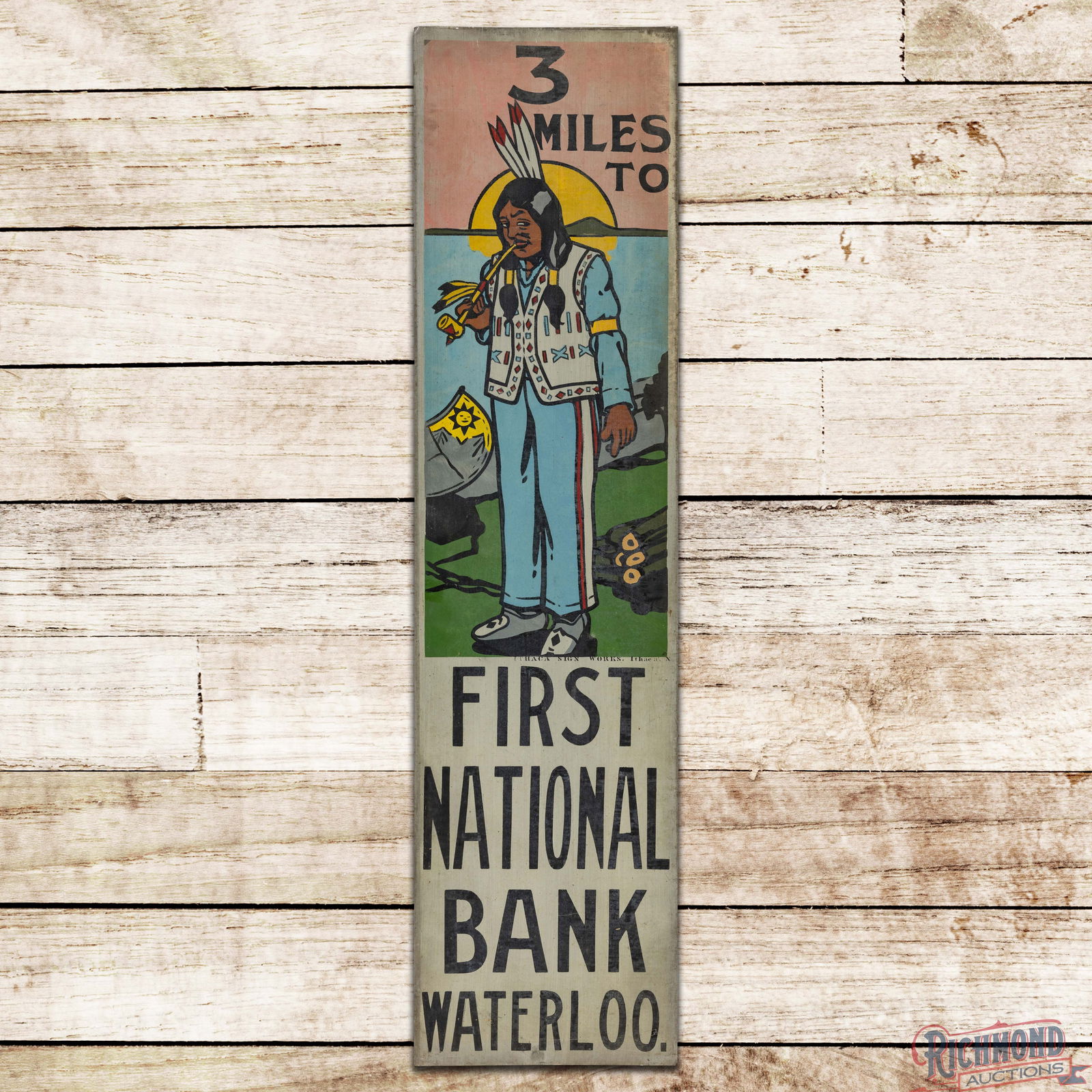 NOS 3 Miles to First National Bank Waterloo Single Sided Tin Ithaca Sign w/ Native American & Pipe: NOS (New Old Stock) SST (Single Sided Tin) sign has excellent color and shine. The field features a detailed graphic of a Native American smoking a pipe with a canoe and a setting sun background. The