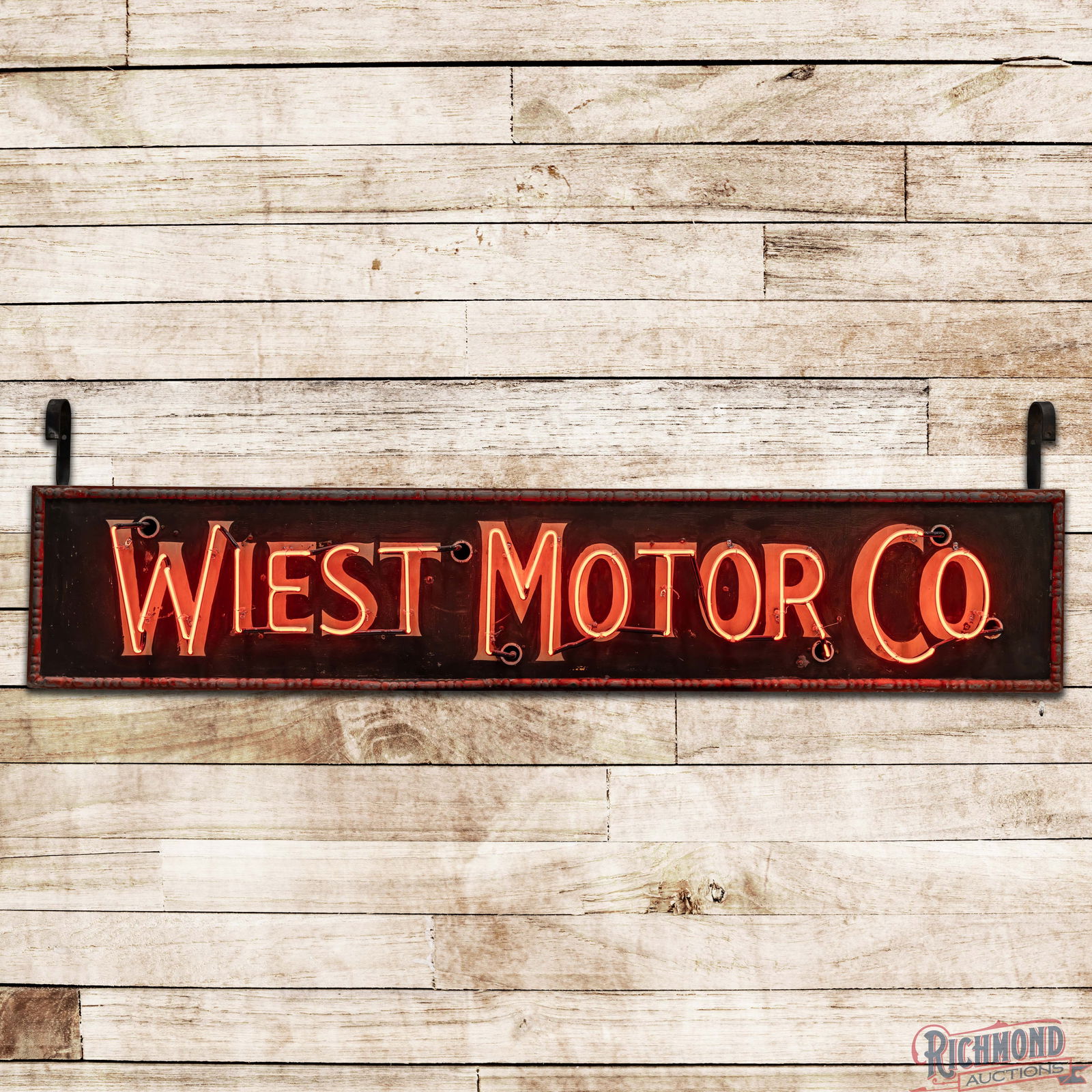 Wiest Motor Co. 7.5' Double Sided Tin Neon Sign: DST (Double Sided Tin) factory neon self-framed sign with the factory metal can has good color and shine. The sign exhibits an older repaint on both sides however, it is done extremely well and does