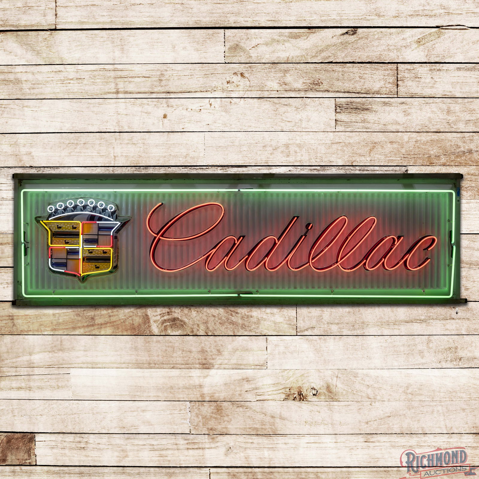 Cadillac Automobiles 12' Emb. Lighted Sign w/ Neon & Crest: Single sided embossed plastic internally lighted sign with added neon and metal can. The sign lights as it should and the neon adds to the signs visual appeal. The field has areas of discoloration and