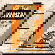 Johnson Oils "Time Tells" One Gallon Metal Knee Action Lubricant Can w/ Logo: Empty one-gallon metal can with lid and handle has good color and shine. The display has fine scratches with areas of discoloration. The reverse has additional spotting in the fields with paint loss