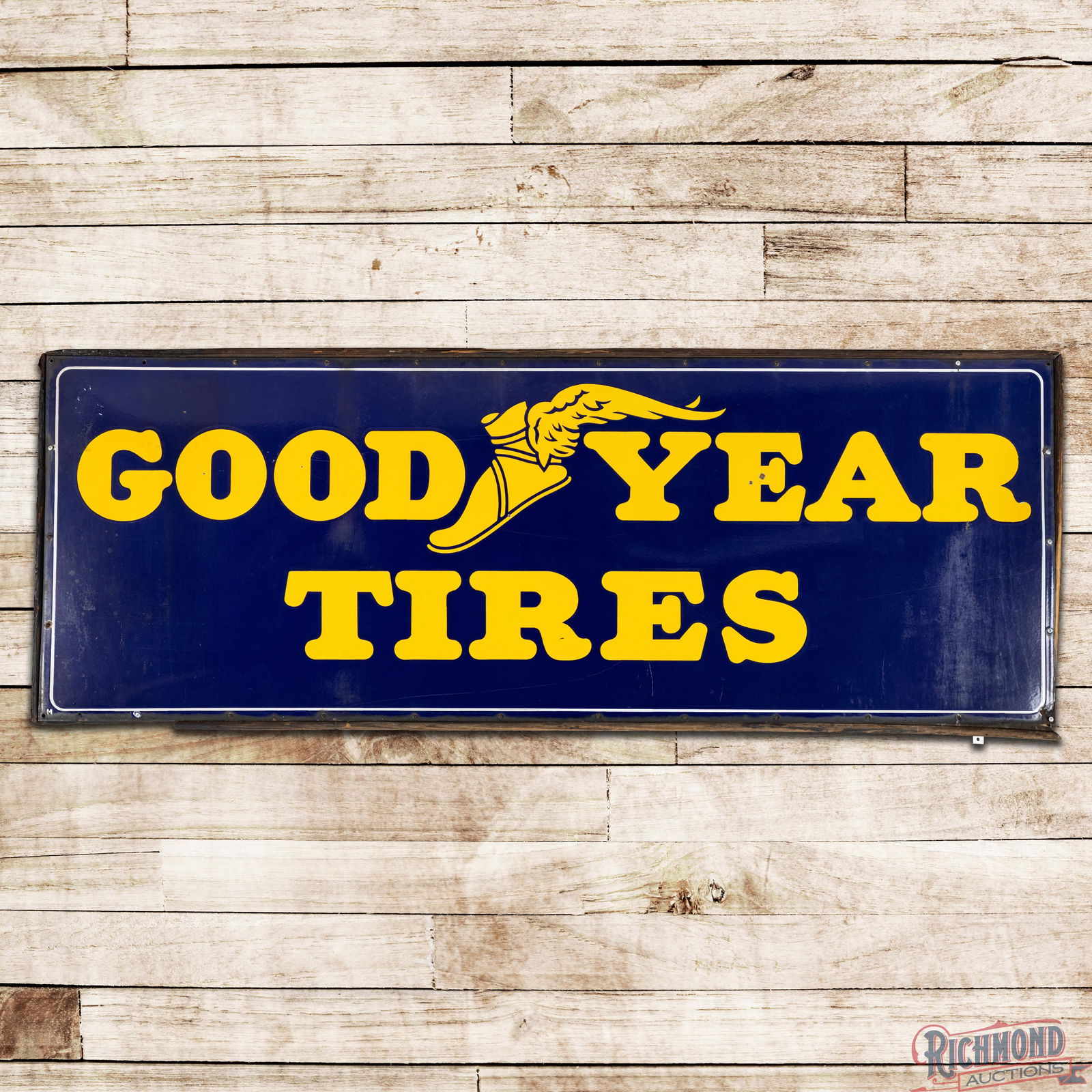 Goodyear Tires 8' Single Sided Porcelain Sign w/ Wingfoot: SSP (Single Sided Porcelain) sign with the factory wooden frame has very good color and gloss. The field light surface wear with small chips and minor discoloration. The perimeter has small chips at