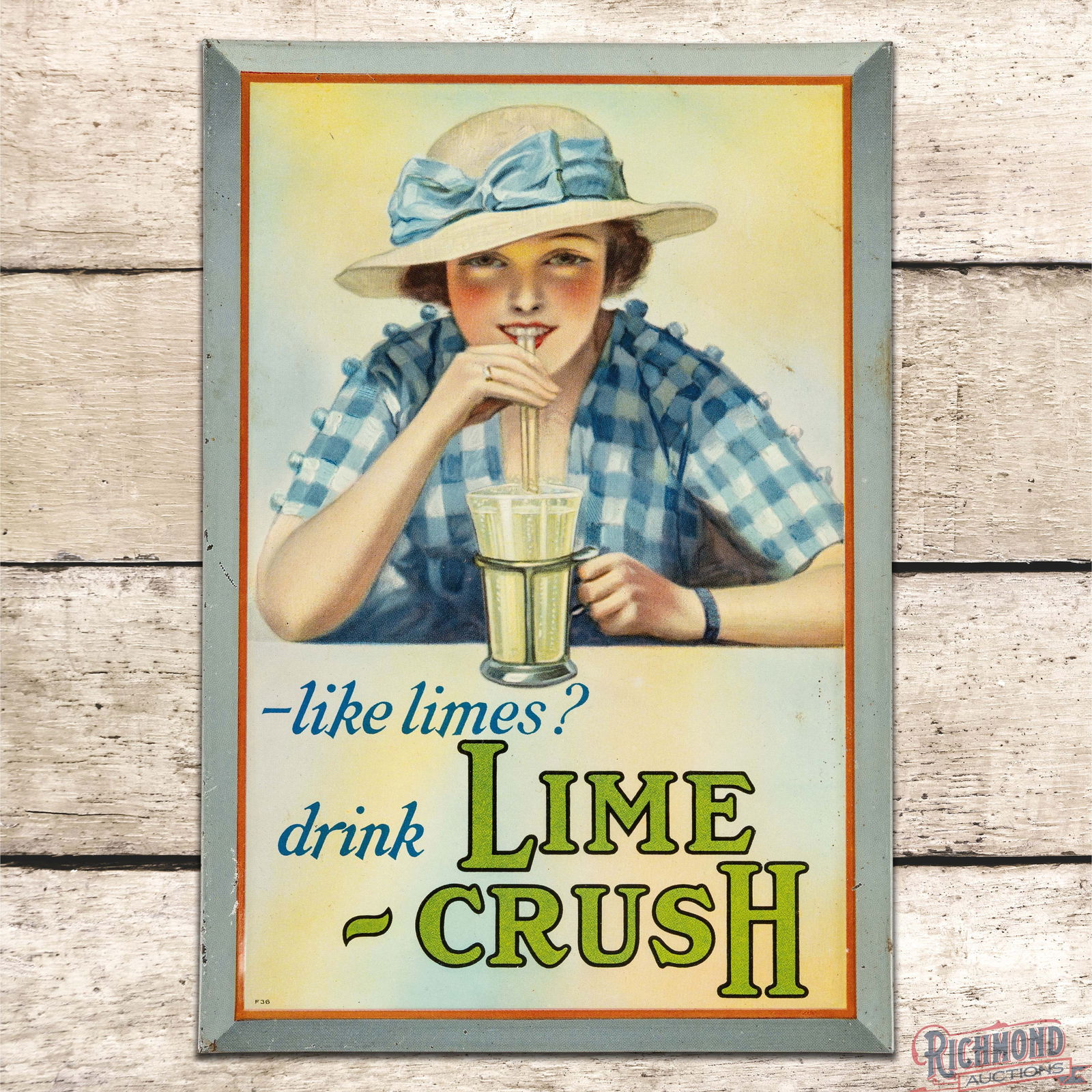 "Like Limes" Drink Lime Crush Single Sided Tin Litho Sign w/ Lady & Glass: SST (Single Sided Tin) sign with cardboard reverse has excellent color and shine. The field surface is very clean overall with minor imperfections which are mainly in the outer fields. The sign