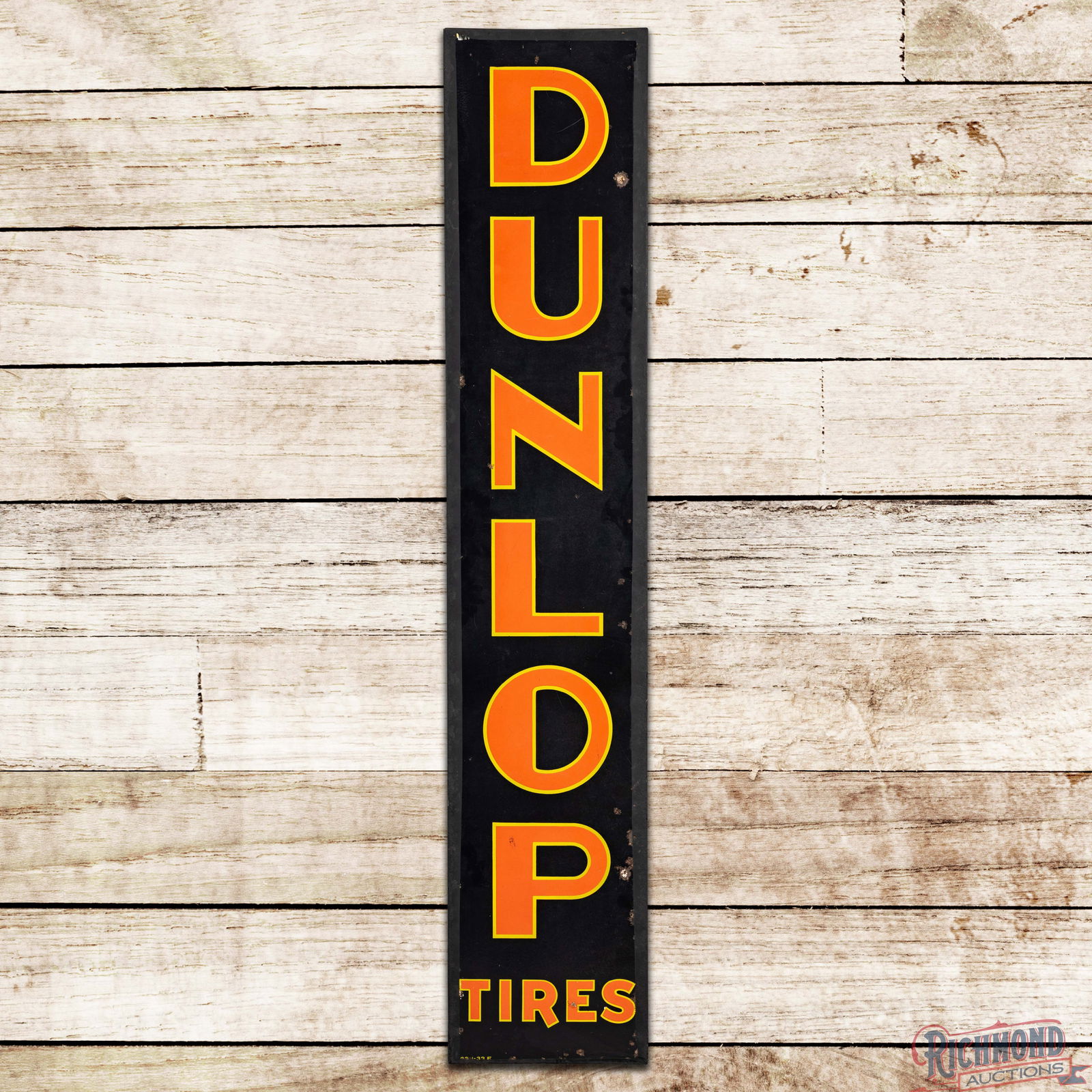 Dunlop Tires 6' Vertical Single Sided Porcelain Sign: SSP (Single Sided Porcelain) rolled-edge sign with an added wooden support frame has good color and gloss. The field has light wear with chips and two non-factory holes in the right outer field. The